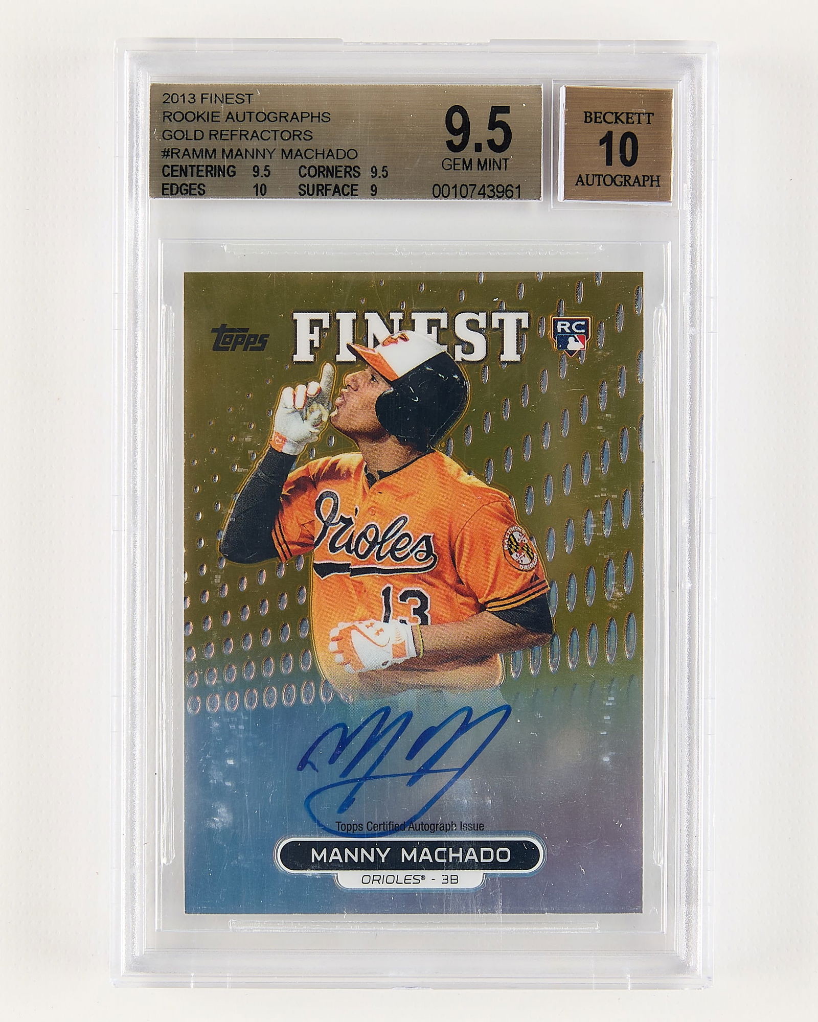 2013 Topps Finest Rookie Auto Machado Gold BGS: 2013 Topps Finest Rookie Autographs Manny Machado gold refractor baseball card. BGS: 0010743961. Height: 5 1/4 in x width: 3 1/4 in.