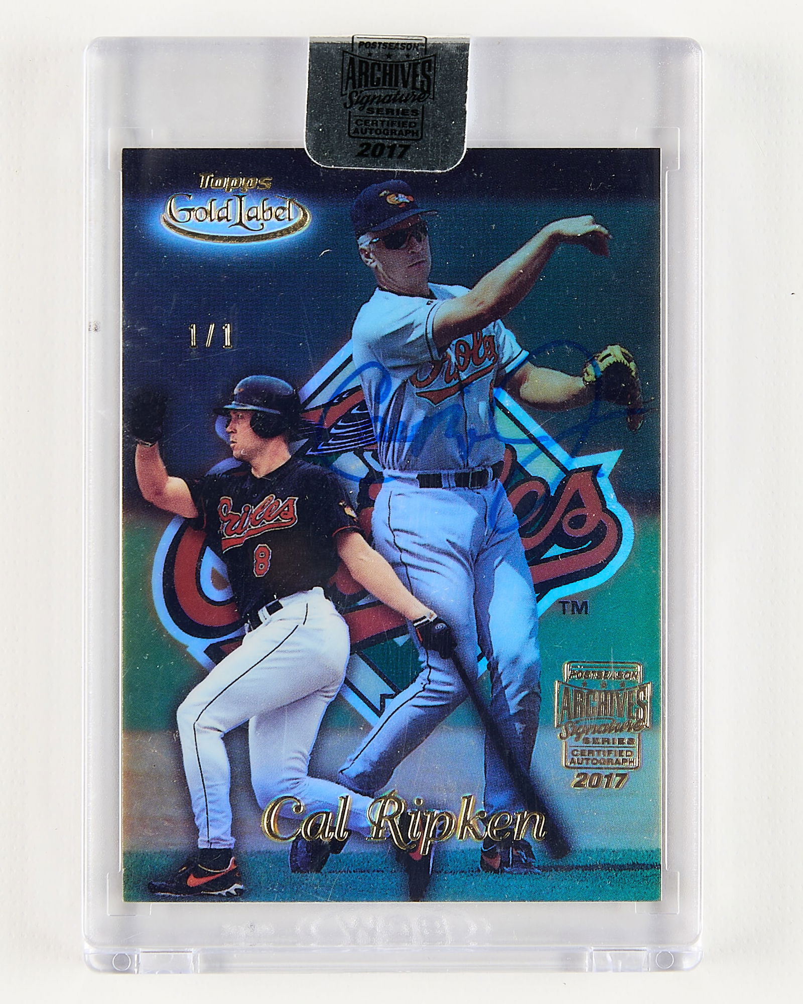 2017/1999 Topps Gold Label Auto Cal Ripken Jr. 1/1: 1999 Topps Gold Label class 1 #67 Cal Ripken card, 1/1. Autographed, stamped, and repackaged as part of the 2017 postseason archives signature series.Height: 4 1/2 in x width: 3 in.
