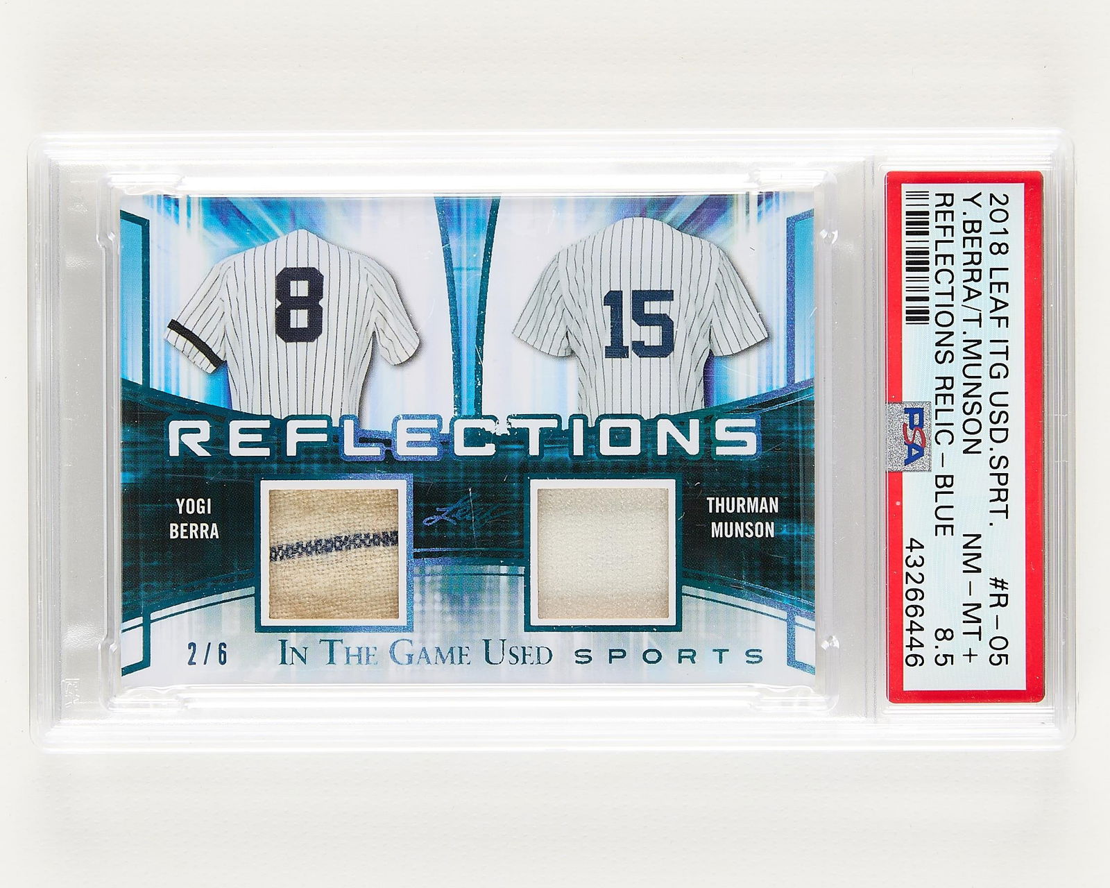 2018 Leaf ITG Used Dual Patch Berra/Munson PSA 8.5: 2018 Leaf In the Game Used Sports Reflections dual relic, blue, Yogi Berra and Thurman Munson baseball card. Numbered 2/6. PSA/DNA: 43266446.Height: 5 1/4 in x width: 3 1/8 in.