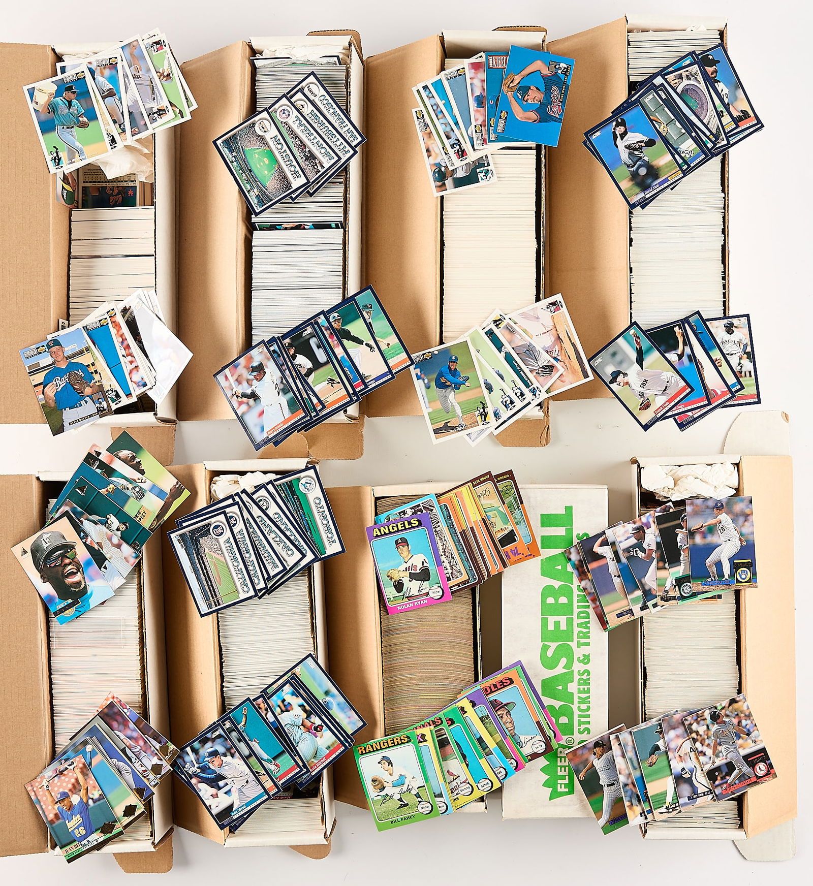 Large Collection Assorted Baseball Cards: Large collection of assorted ungraded baseball cards. (Shipping) height: 14 in x width: 13 in x depth: 16