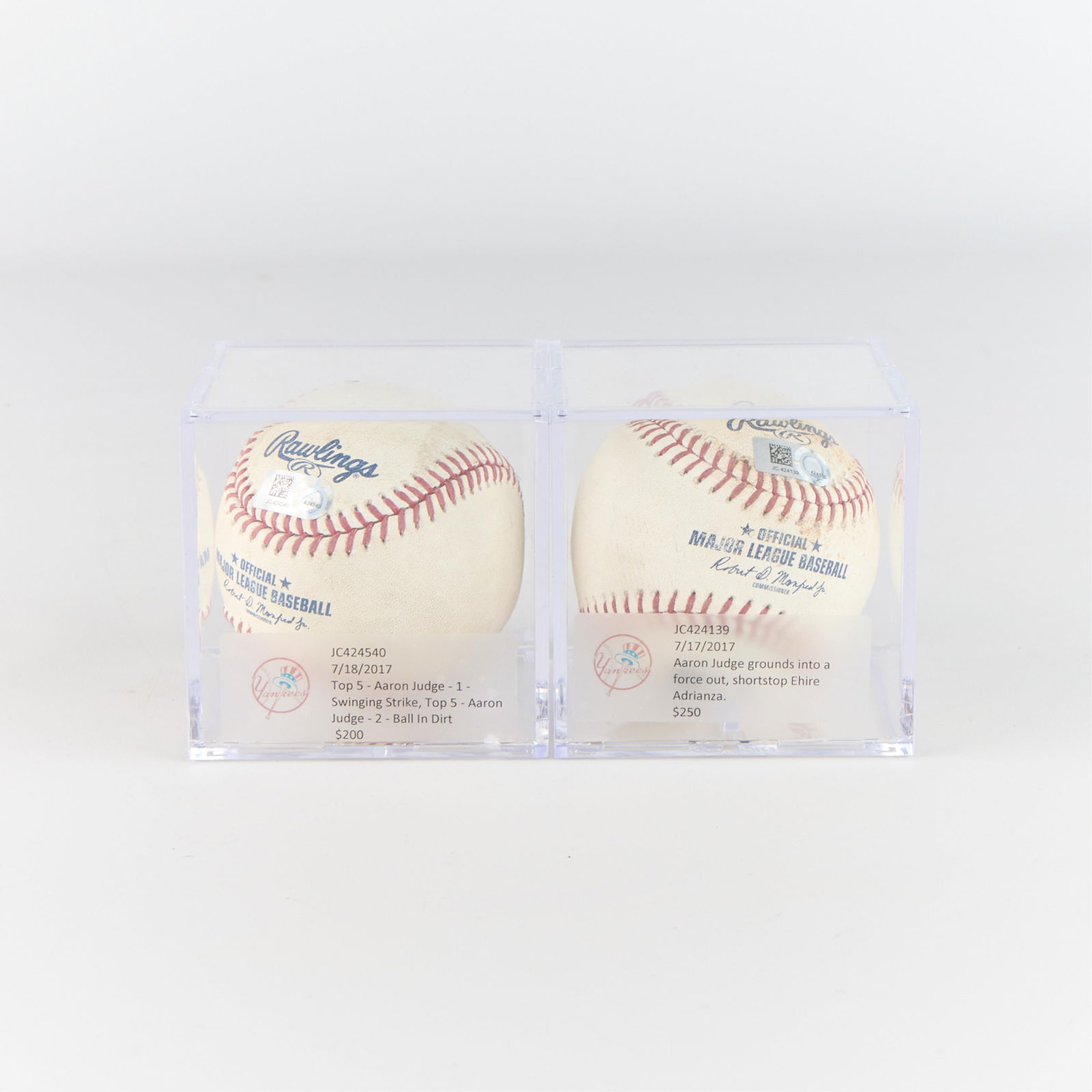 2 Aaron Judge Game Used Balls: Group of two Aaron Judge game used baseballs. MLB: JC424139, JC424540. (Shipping dimensions) height: 3 1/2 in x width: 6 1/2 in x depth: 3 1/2 in.