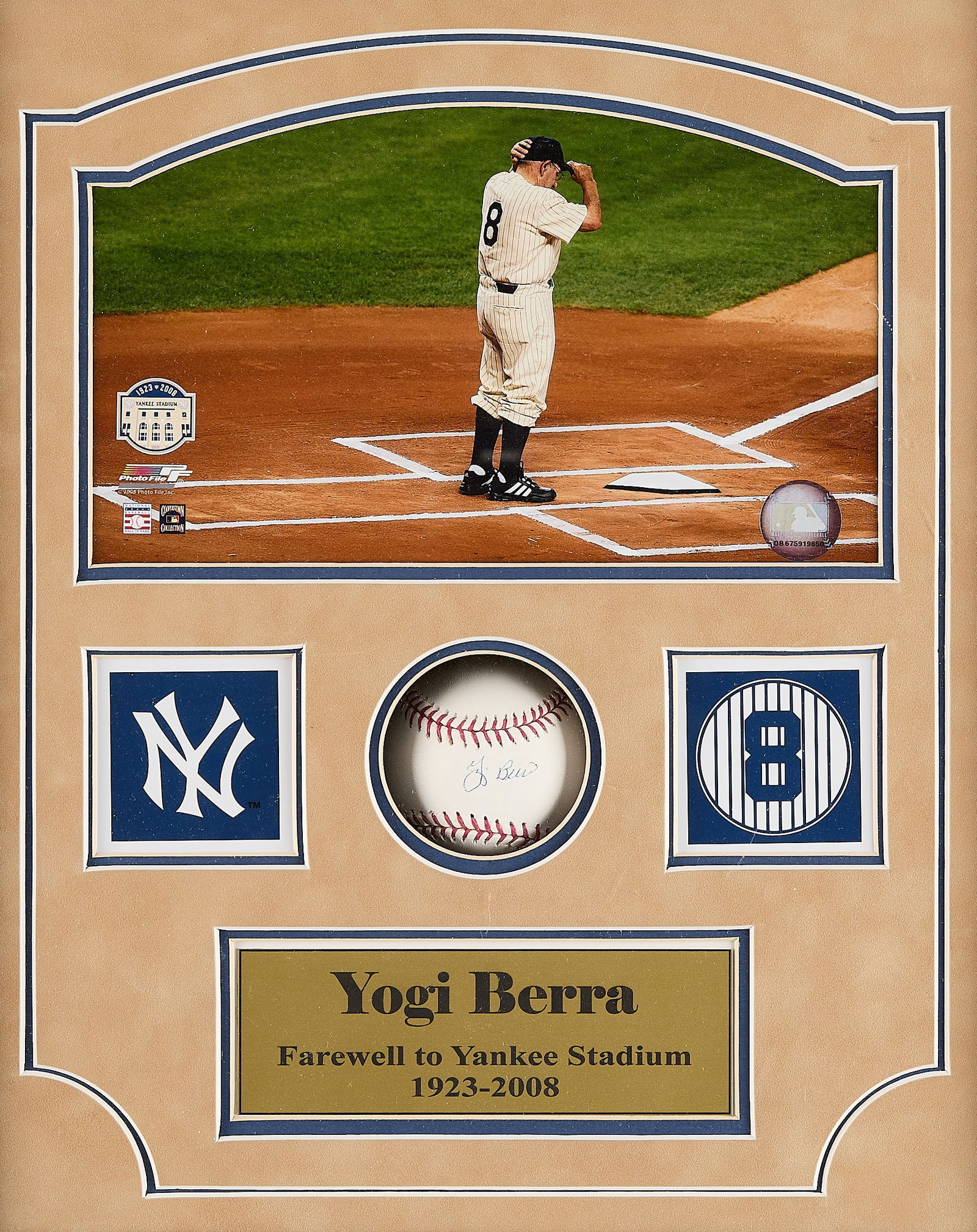 Framed Yogi Berra Signed Baseball w/ Photo: Yogi Berra autographed baseball with photograph. Framed with a plaque that reads "Yogi Berra: Farewell to Yankee Stadium 1923-2008)." Baseball: Steiner BERRABAS000017. Photograph: MLB DB675919850.