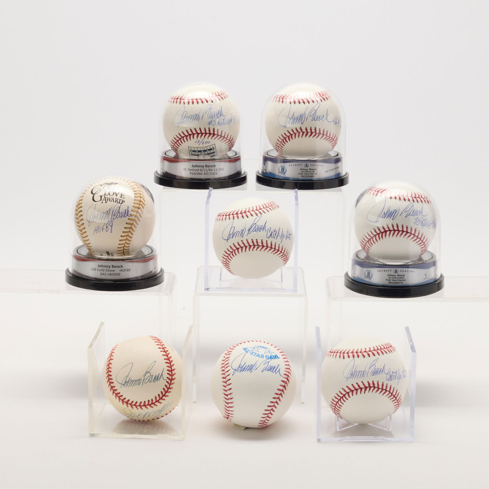 8 Johnny Bench Baseballs Signed & Inscribed: Group of eight baseballs signed by Johnny Bench, some inscribed. Beckett: H80099, 0012352800, 0012300771; PSA: 4A13807, 4A13830, AD15328; two unauthenticated. (Shipping dimension) height: 6 1/2 in x
