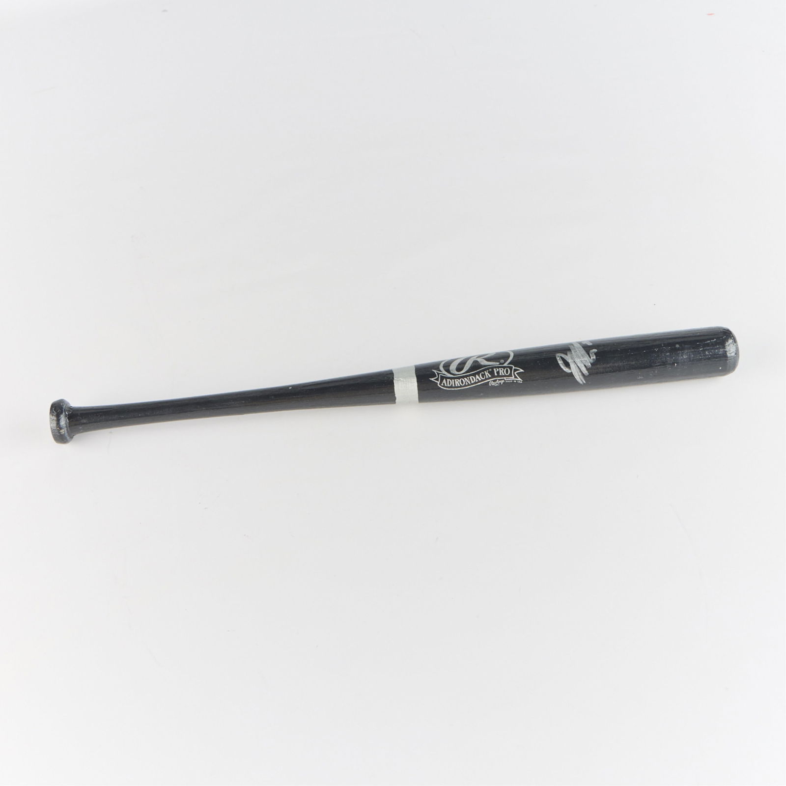 Joe Mauer Twins Signed Mini Bat: Miniature Rawlings Adirondack Pro black baseball bat. Signed in silver ink. Global certified authentic sticker GV535759. Length: 17 in x diameter: 1 1/2 in.