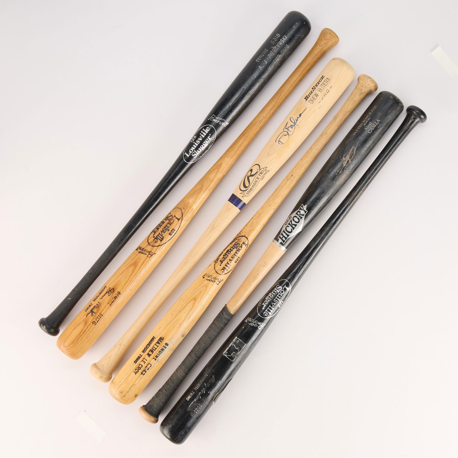 6 Bats Poss. Game Used: Group of six bats. Possibly game used. One signed by Drew Butera. Each, length: 34 in x diameter: 2 1/2 in.