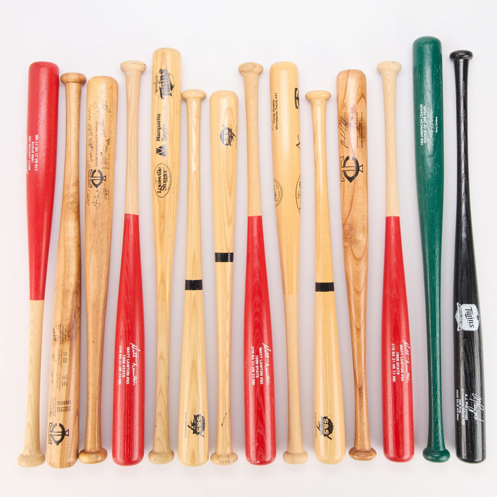 14 Promo & Other Baseball bats: Group of 14 various promotional and name-branded bats. One with printed signatures of the 2008 Twins team. Others with printed signatures of assorted players. Length ranges from 26 1/2 in to 30 in;