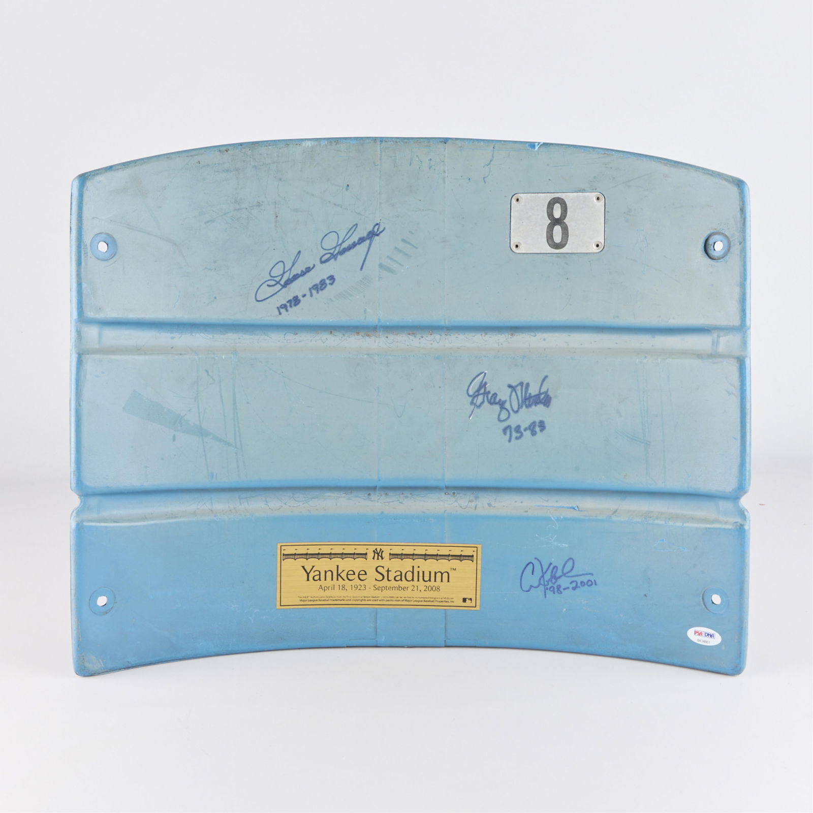 Original Yankee Stadium Seat Back Signed: Original blue plastic seat back from Yankee Stadium (April 18, 1923 - September 21, 2008), numbered 8. Signed in blue ink by Goose Gossage, Chuck Knoblach, and Graig Nettles. PSA/DNA: 8A34861. (Case)