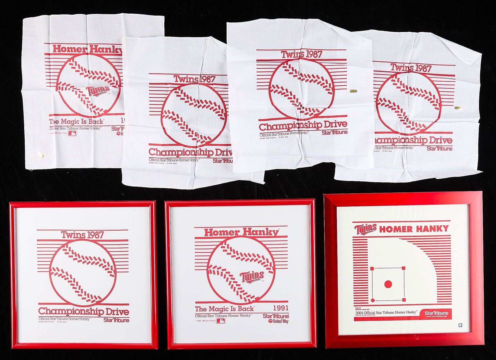7 MN Twins Homer Hankies: Three framed, four unframed. Including four 1987, two 1991, and one 2004. (Hankies, each) height: 16 in x width: 16 in.