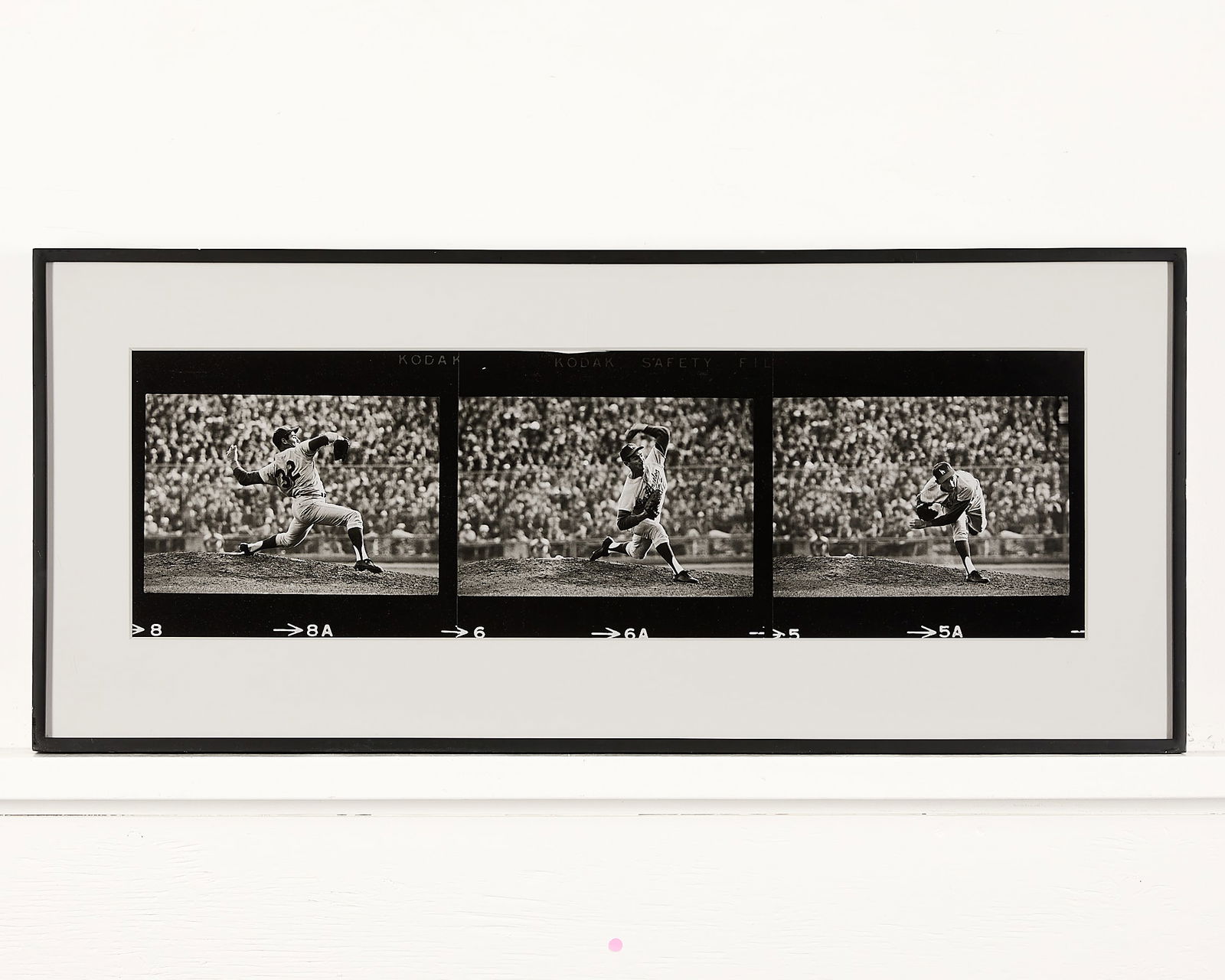 Walter Ioos "Sandy Koufax, WS at Mpls" Photo 1965: Walter Ioos (American, b. 1943). Gelatin silver print photograph titled "Sandy Koufax, World Series at Mpls" 1965. Depicting three non-sequential images of what Ioos described as "Koufax's perfect