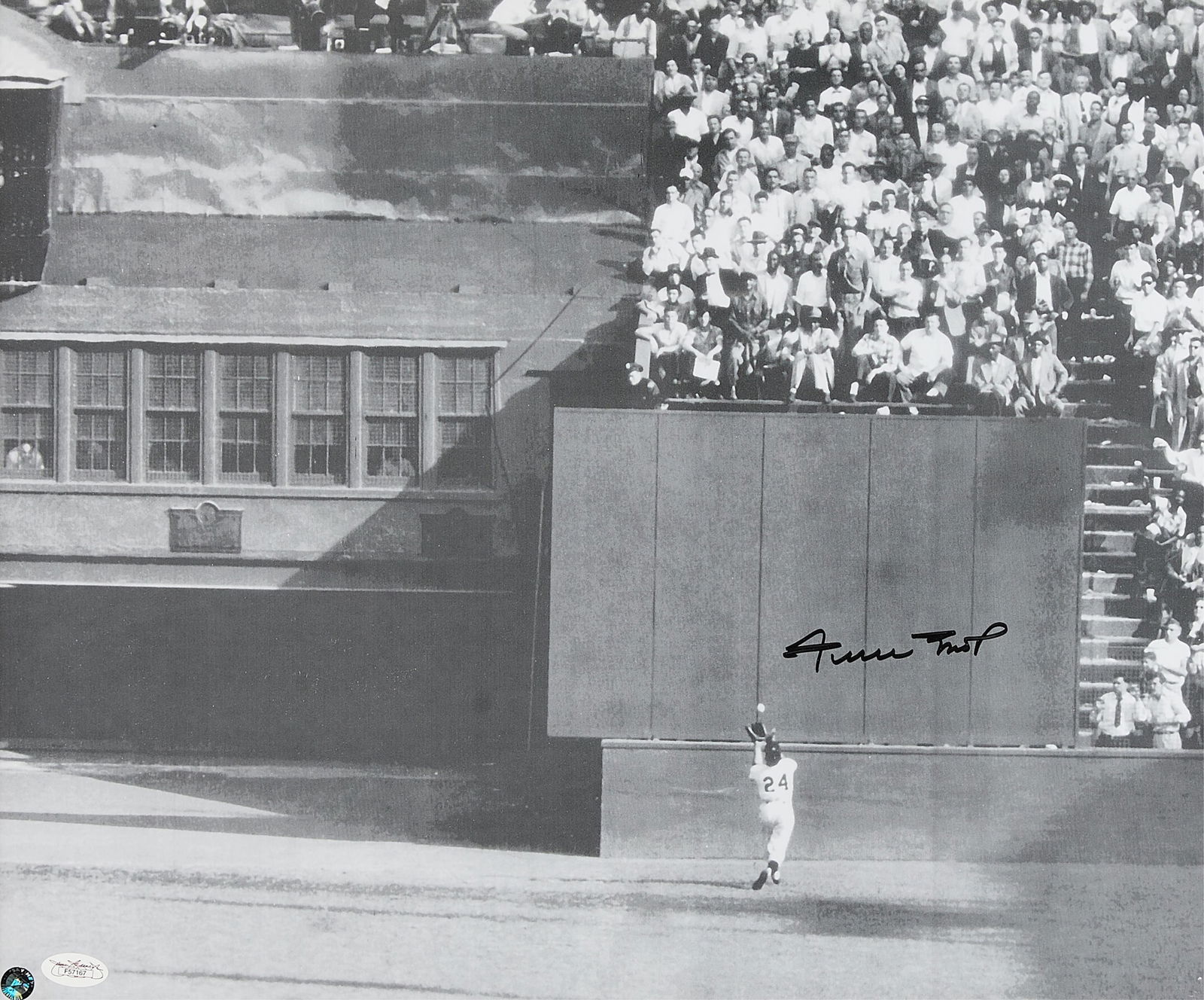 Willie Mays Signed Photograph: Willie Mays signed photograph. With plate below reading "Willie Mays San Francisco Giants 'The Catch'." Two stickers in the lower left corner of the phtoograph. One hologram sticker "Say Hey"