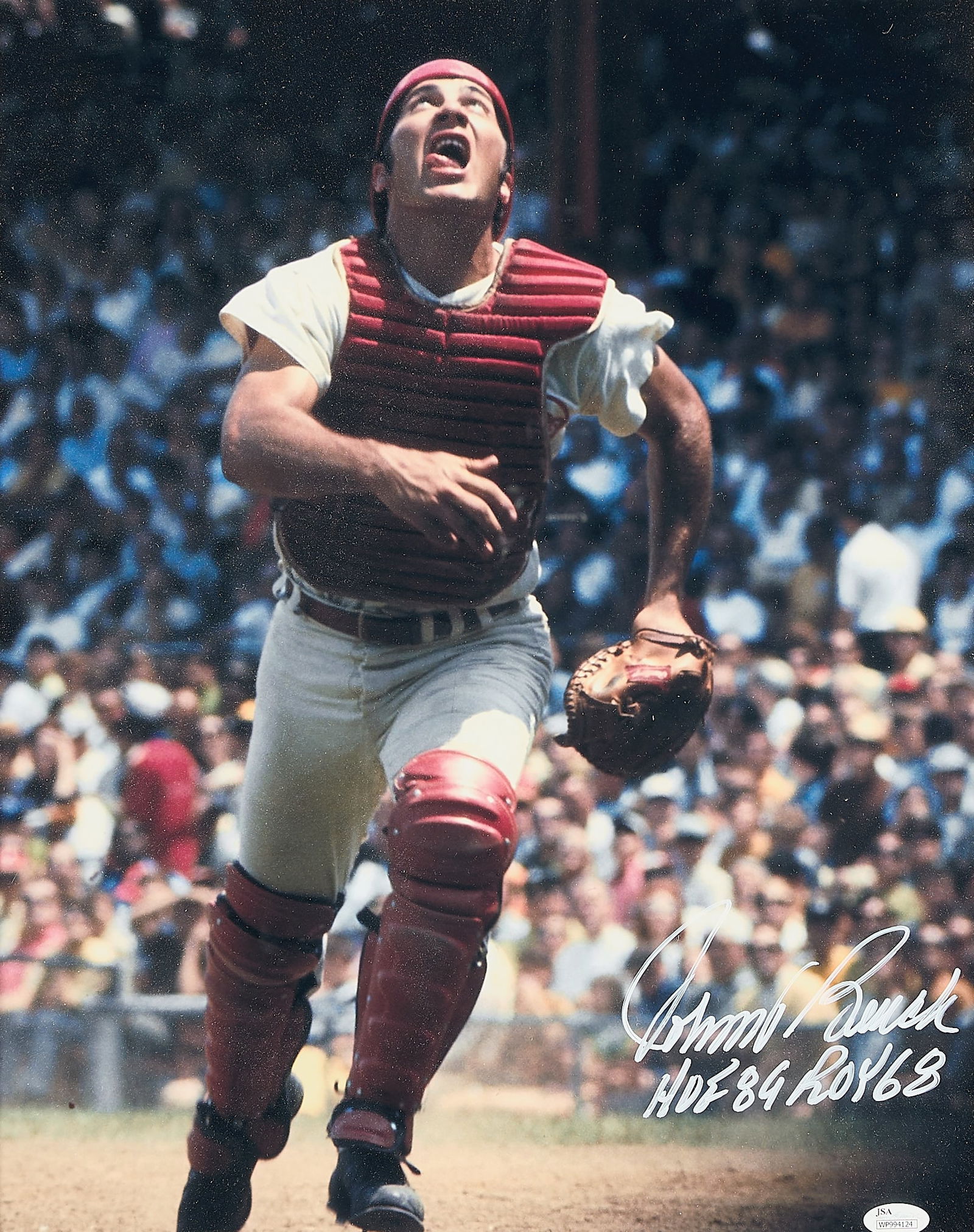 Johnny Bench Signed Color Photo JSA: Johnny Bench autographed color photograph depicting Bench attempting to catch a ball. Signed in silver ink with statistic inscription along the lower left. JSA: WP994124. Sight; height: 18 3/4 in x