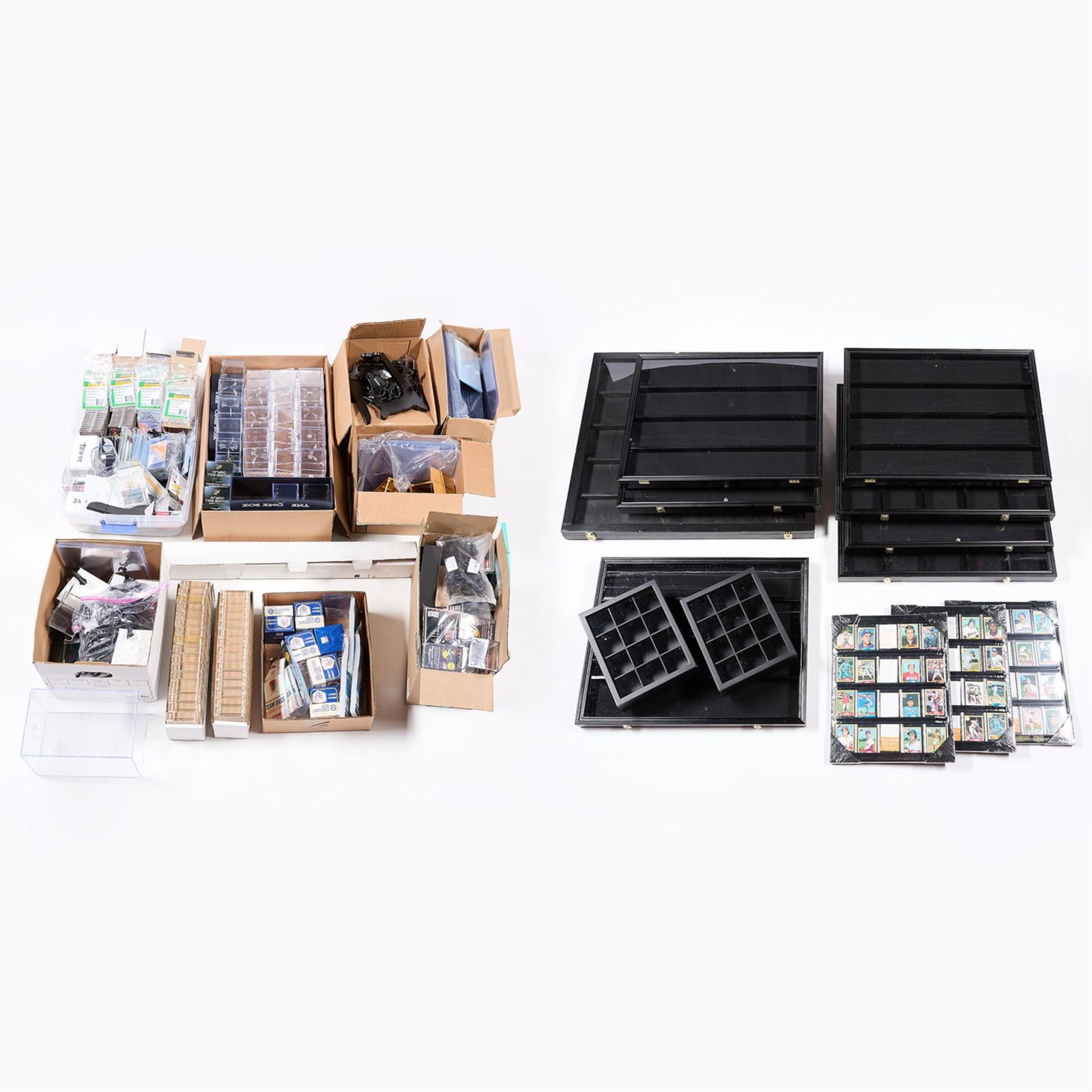 Large Group Baseball/Sport Display Items: Large group of sports display items such as a baseball bat frame, card sleeves, baseball holders, and more. (Shipping) height: 54 in x width: 44 in x depth: 31 in.