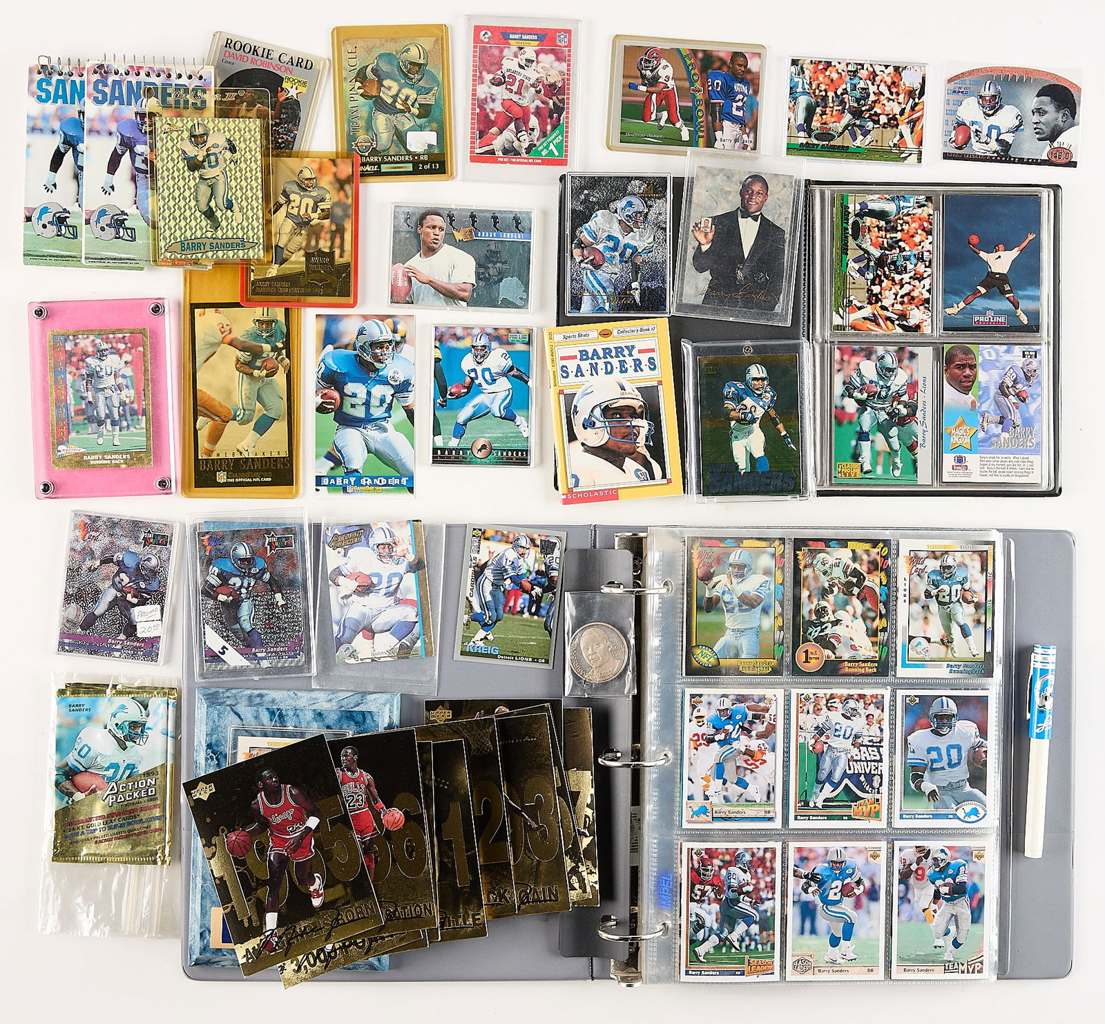 Barry Sanders & Michael Jordan Sports Memorabilia: Large collection of sports memorabilia related to NFL Detroit Lions star Barry Sanders and NBA Chicago Bulls icon Michael Jordan. Including trading cards, pocket notebooks, Barry Sanders 1989 Rookie