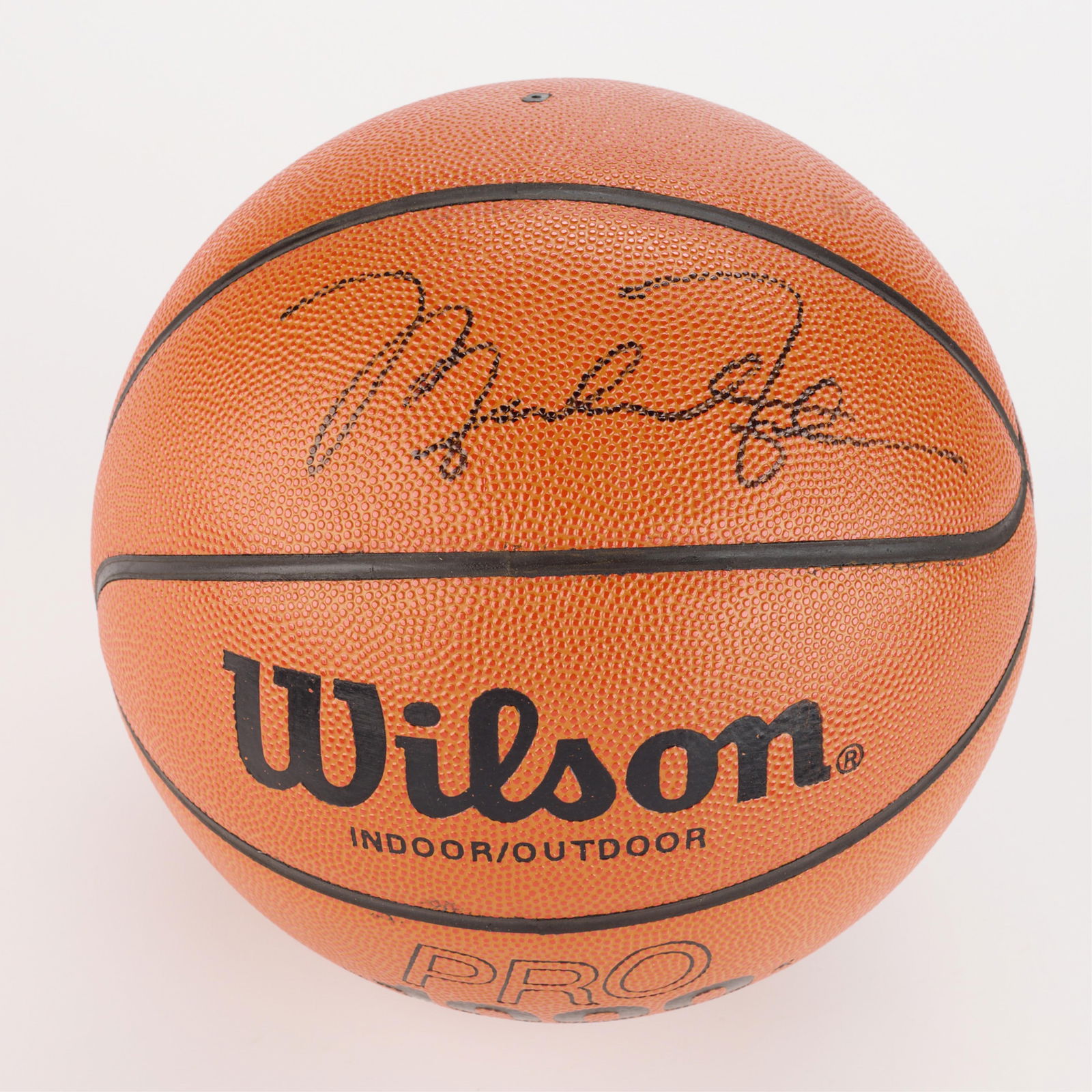 Michael Jordan Basketball Signed: Michael Jordan signed basketball. In a mirrored display case. (Case) height: 11 1/2 in x width: 11 1/2 in x depth: 11 1/2 in.