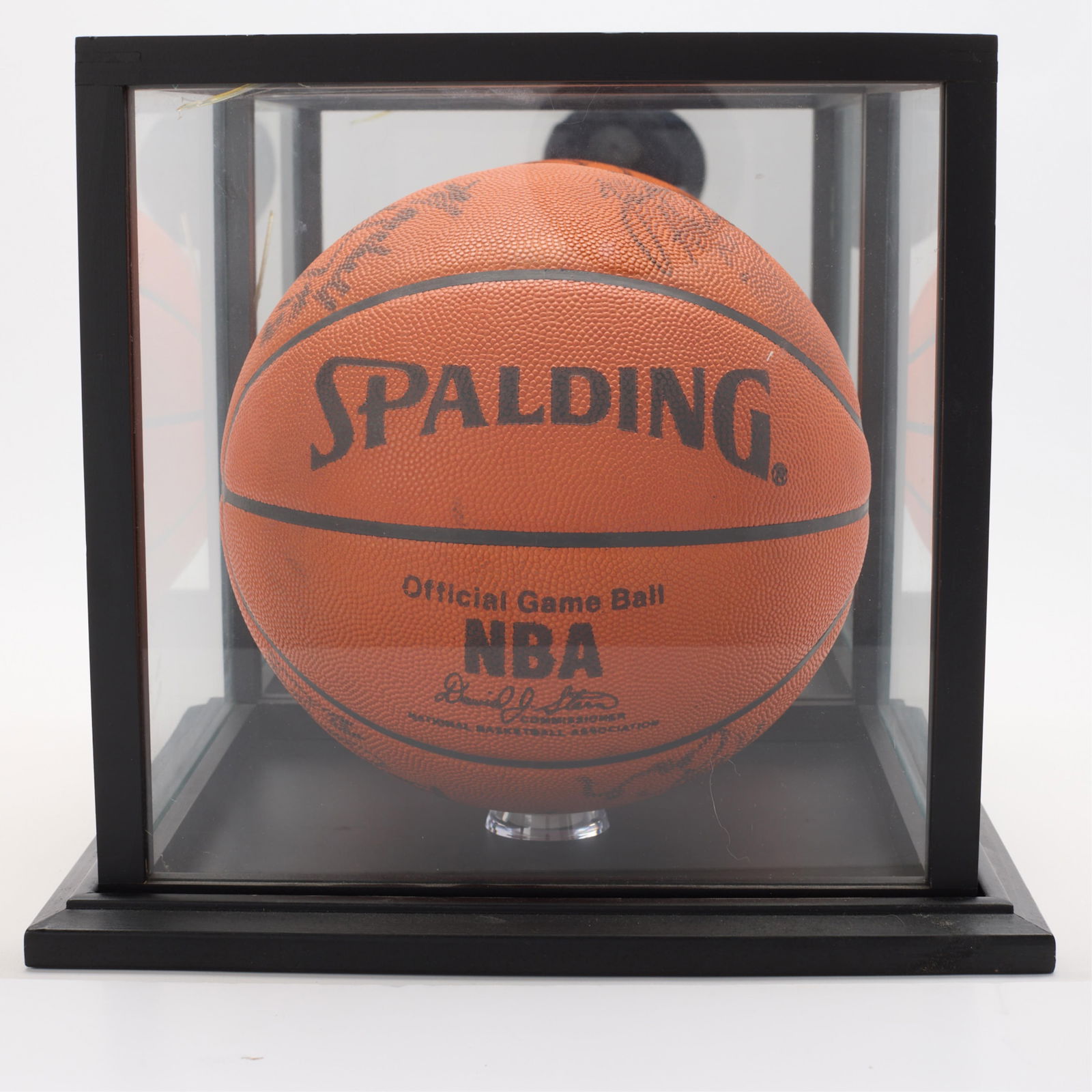 Signed Basketball - Magic Johnson, JR Smith & More: Autographed Spalding basketball. With signatures in silver and black ink of Magic Johnson, J.R. Smith, and others. (Case) height: 11 1/2 in x width: 12 3/4 in x depth: 12 3/4 in.