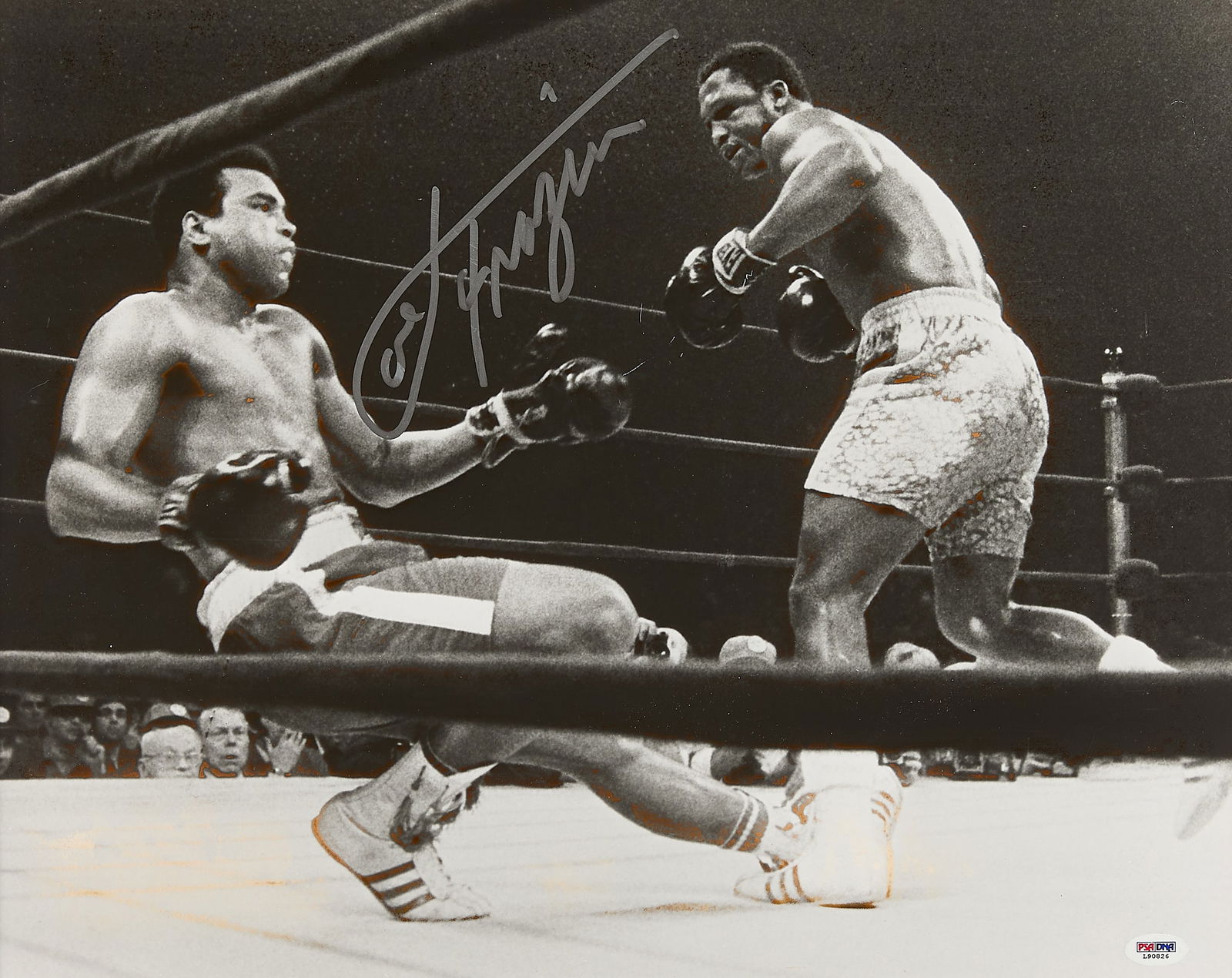 Joe Frazier Signed Photo: Joe Frazier signed photograph depicting Frazier striking Muhammed Ali. PSA-DNA sticker in lower right corner L90826. Height: 24 in x width: 28 in x depth: 1 in.