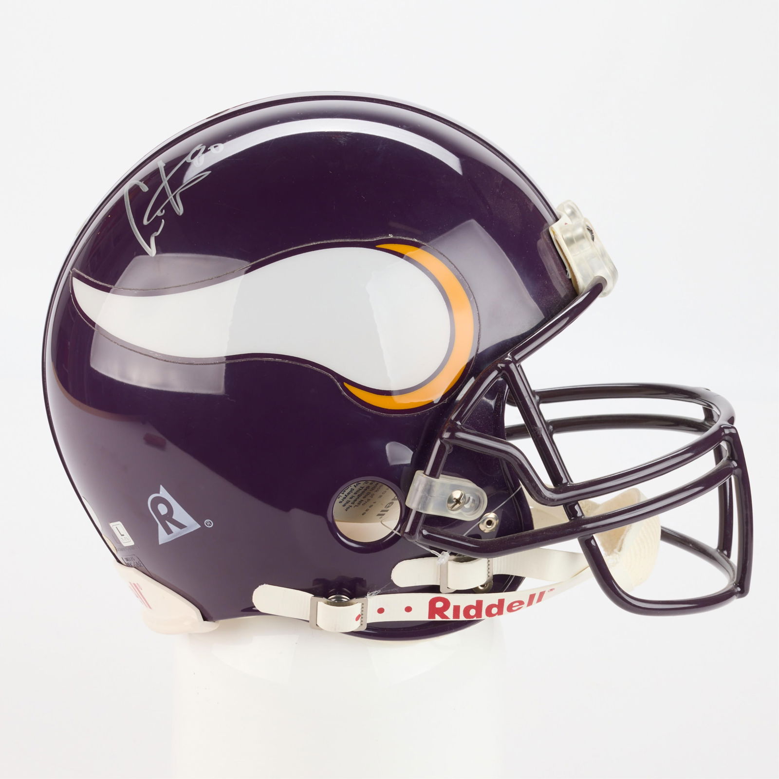 Cris Carter Vikings Helmet Signed: Cris Carter signed Minnesota Vikings full-sized football helmet. Size large Riddell On Field pro line helmet. Stickers for Gallery of SuperStars and Schwartz Sports on back of helmet. NFL hologram sti