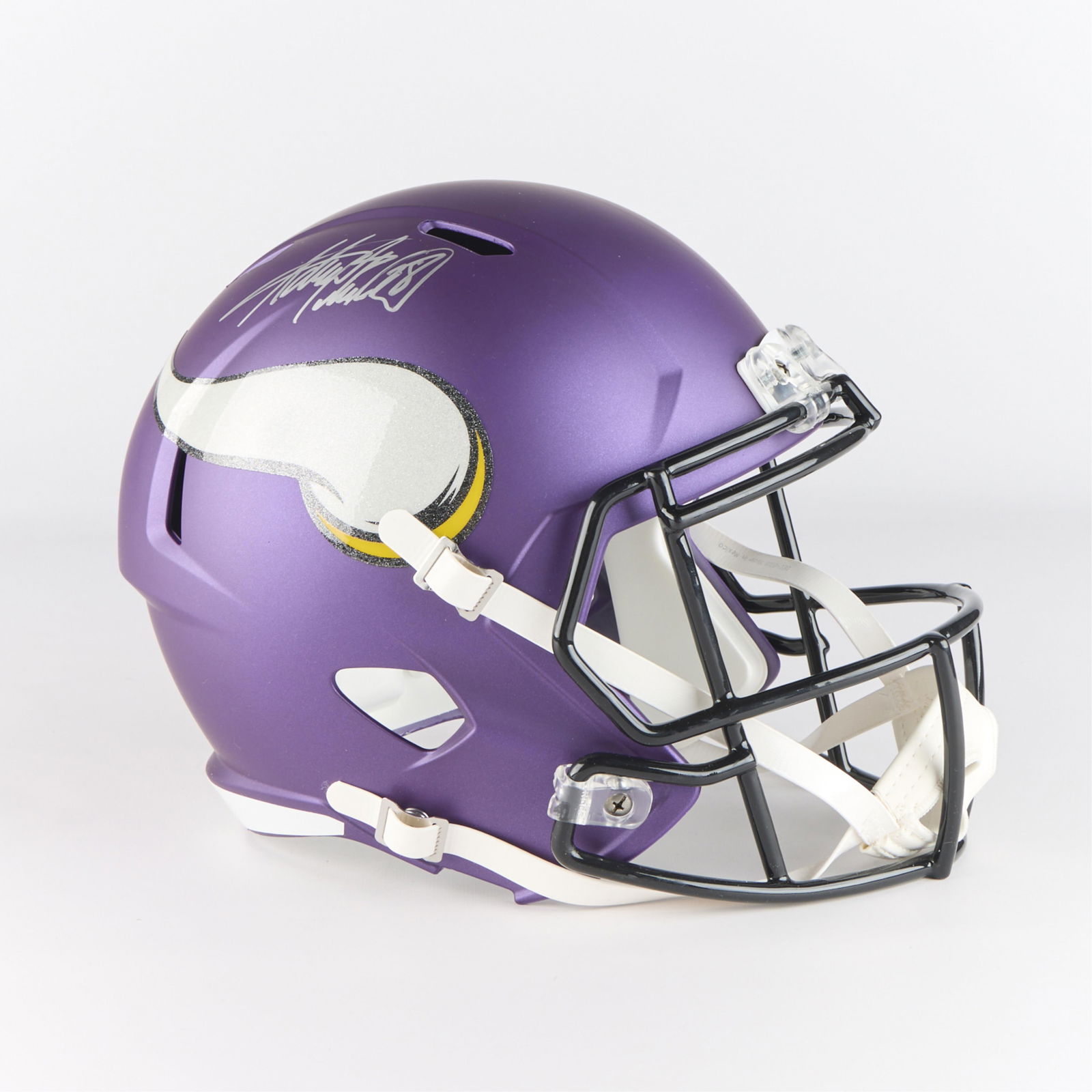 Adrian Peterson Signed MN Vikings Helmet: Adrian Peterson autographed Minnesota Vikings helmet. Signed in silver sharpie. Riddell size large speed replica helmet, NFL: LA612087801, with original box.(Box) height: 10 1/2 in x width: 14 in x de