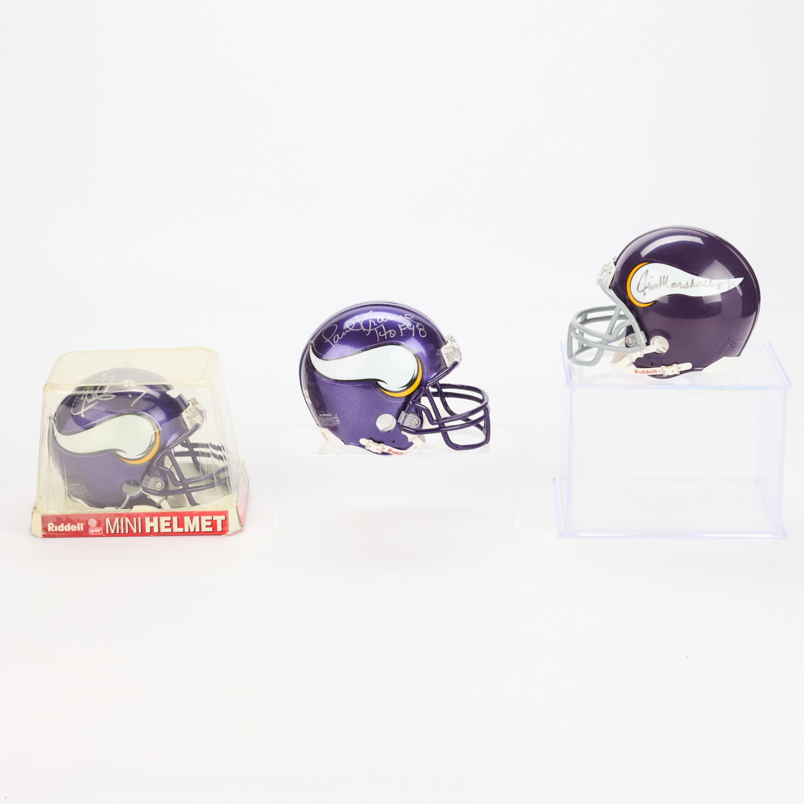 3 Signed Vikings Mini Helmets: Including: Paul Krause signed Minnesota Vikings Riddell mini football helmet, Hologram Sports Integrity sticker on back; Jim Marshall signed Minnesota Vikings Riddell mini football helmet; Chad Greenw
