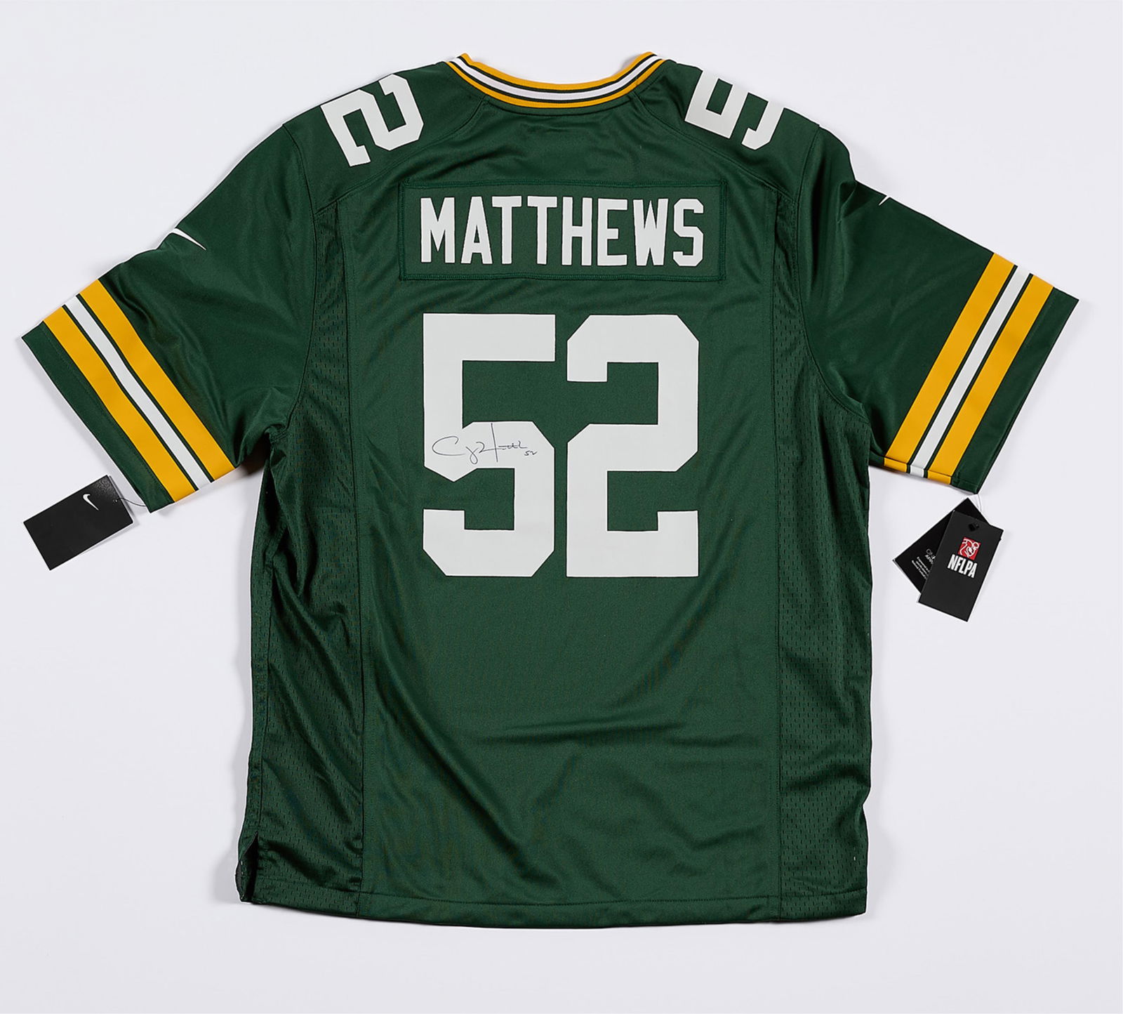 Clay Matthews Autographed Packers Jersey: Clay Matthews autographed Green Bay Packers football jersey. Signed in black ink along the back number. JSA: FF42565. Size: XL.