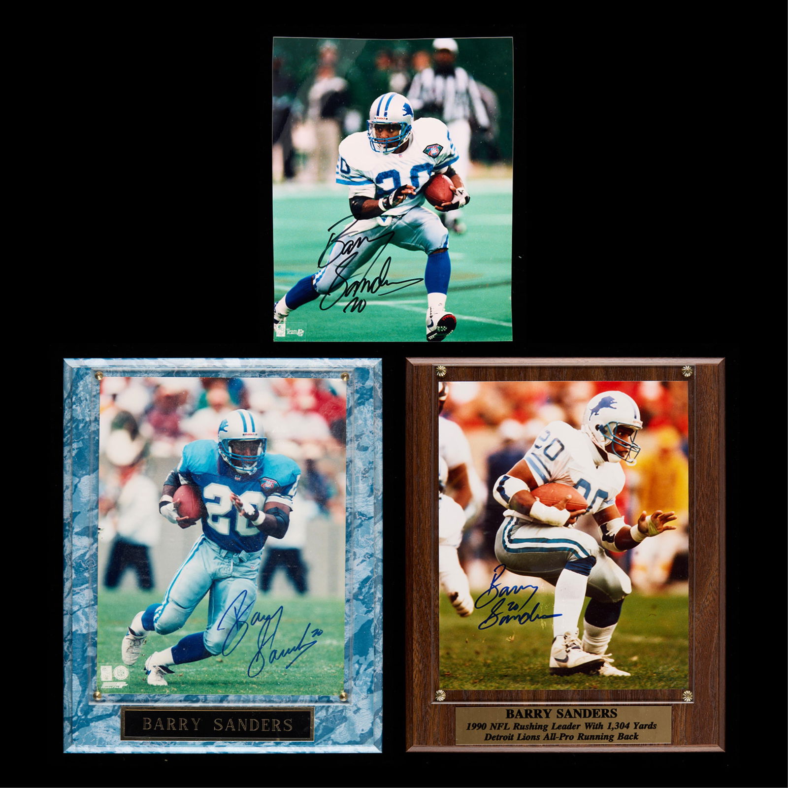3 Signed Barry Sanders Photographs & Plaques: Three signed photographs of NFL Detroit Lions All-Pro running back, Barry Sanders. Including two photographs mounted as plaques. Each with Certificates of Authenticity. (Plaques, each) Height: 13 in