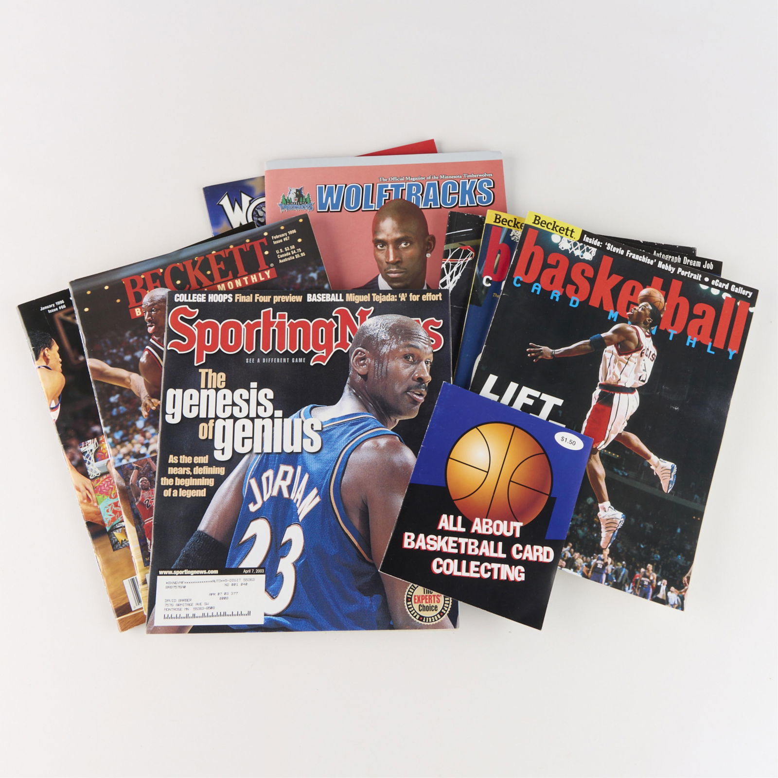 8 Sports Magazines & 1 Card Collecting Book: Group of nine pieces of vintage NBA ephemera, including the 2007-2008 Minnesota Timberwolves yearbook, one pocketbook manual on basketball card collecting, and magazine publications from Beckett