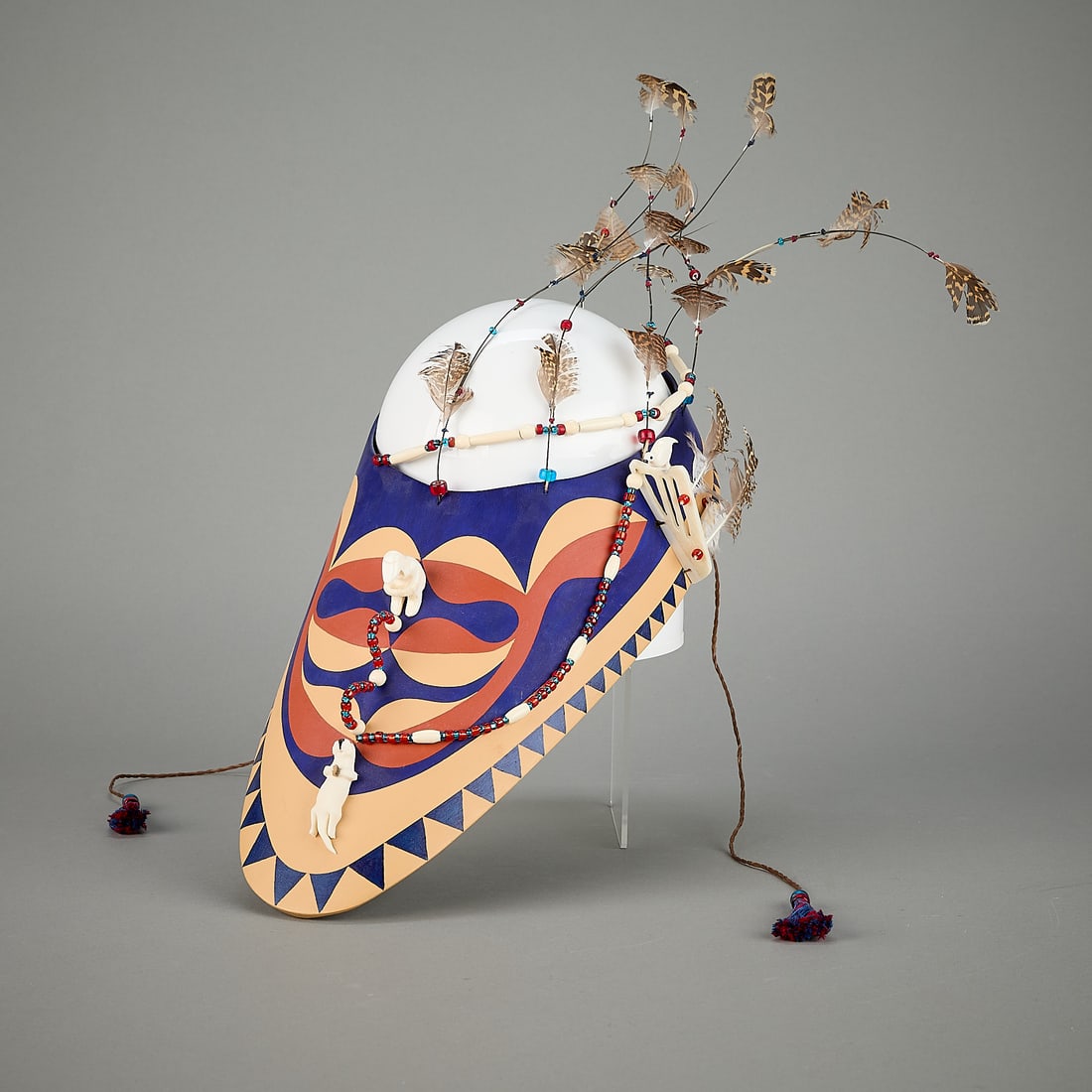 Peter Lind Aleutian Bentwood Hunter's Visor: Peter Lind (Aleut/Alutiiq (Cirniq - Chignik), b. 1930). Large bentwood and open-crown hunting visor, 20th century. Depicting painted geometric motifs, with applied strands of glass beads, feathers, an