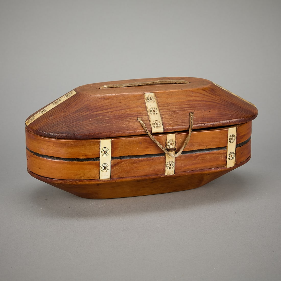 Inupiaq Alaskan Bentwood Box ex. Hancock Collection: Inupiaq/Alaskan bentwood box with applied carved organic material placards inscribed with circle and dot motif, ten placards total. Unmarked. With tags indicating association with Eleanor Tulman