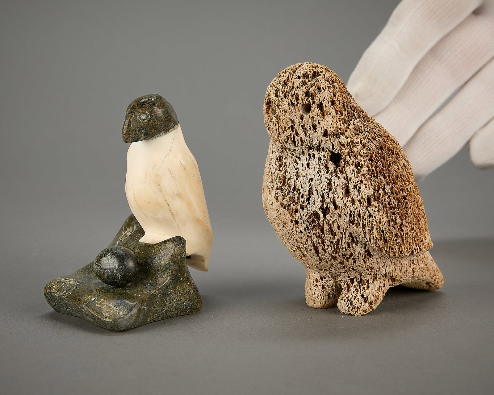 Jacob Irkok & Mariano Aupillardjuk Bird Carvings: Two bird carvings including: Jacob Irkok (Inuit (Arviat), 1937-2009). Carved organic material owl, circa 1960. Mariano Aupillardjuk (Inuit (Kangiqliniq - Rankin Inlet), b. 1923). Carved stone and