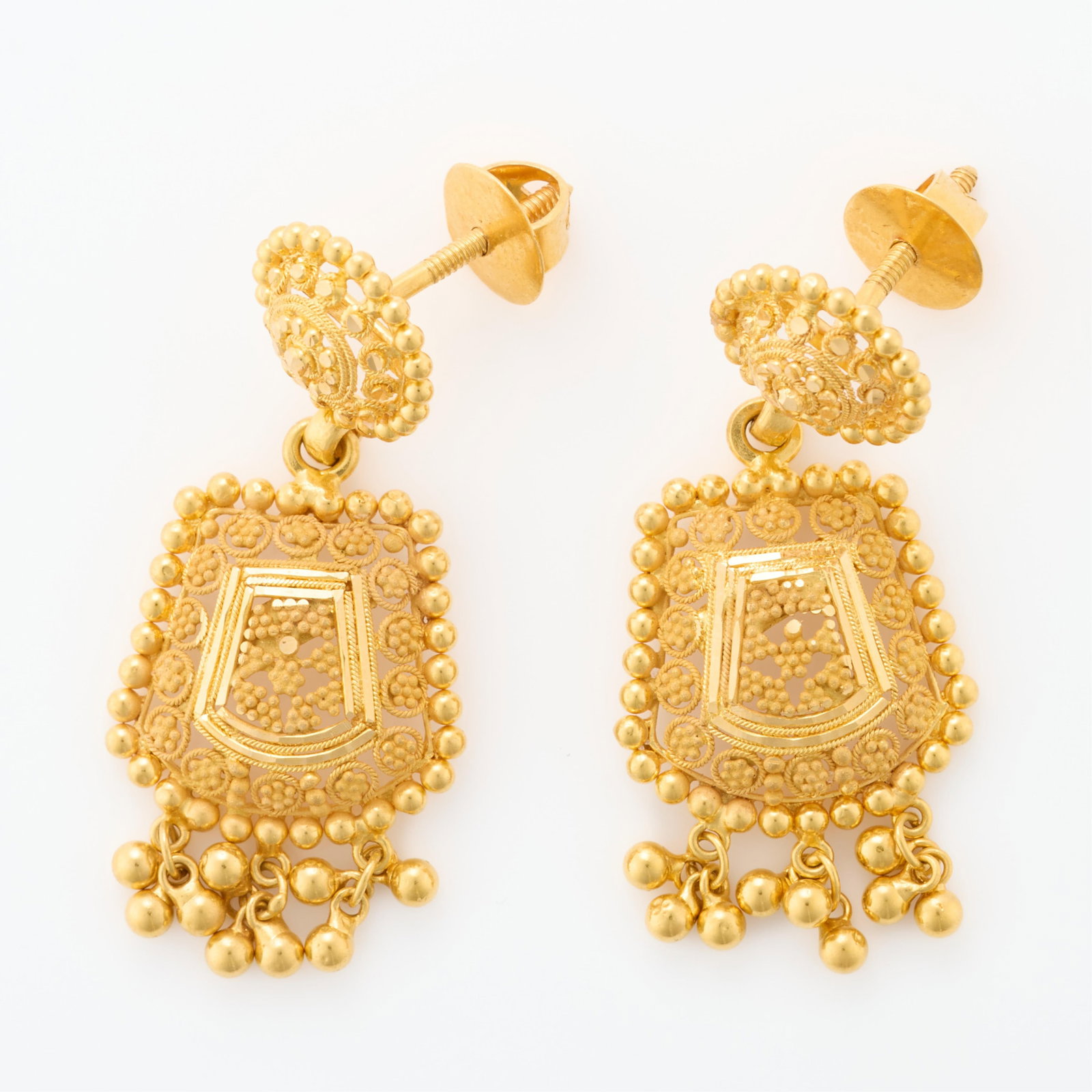 22k KDM Gold Earrings: 22k cadmium gold filigree and dangle earrings. On posts with screwbacks. Marked SC KDM KJ 22/22. (Each) Length: 1 1/2 in. Gross weight: 10.0 g.