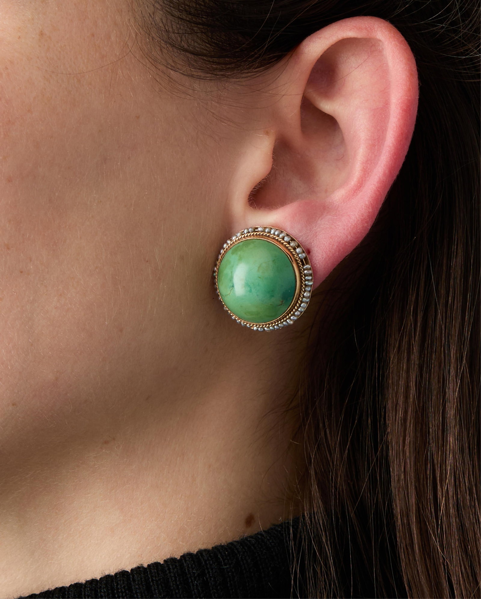 14k Malachite & Seed Pearl Clips: 14k yellow gold clip back earrings set with a central cabochon malachite, surrounded by a milgrain gild border with small seed pearls. On clip backs, marked 14k along the back.(Each) Diameter: 3/4 in.