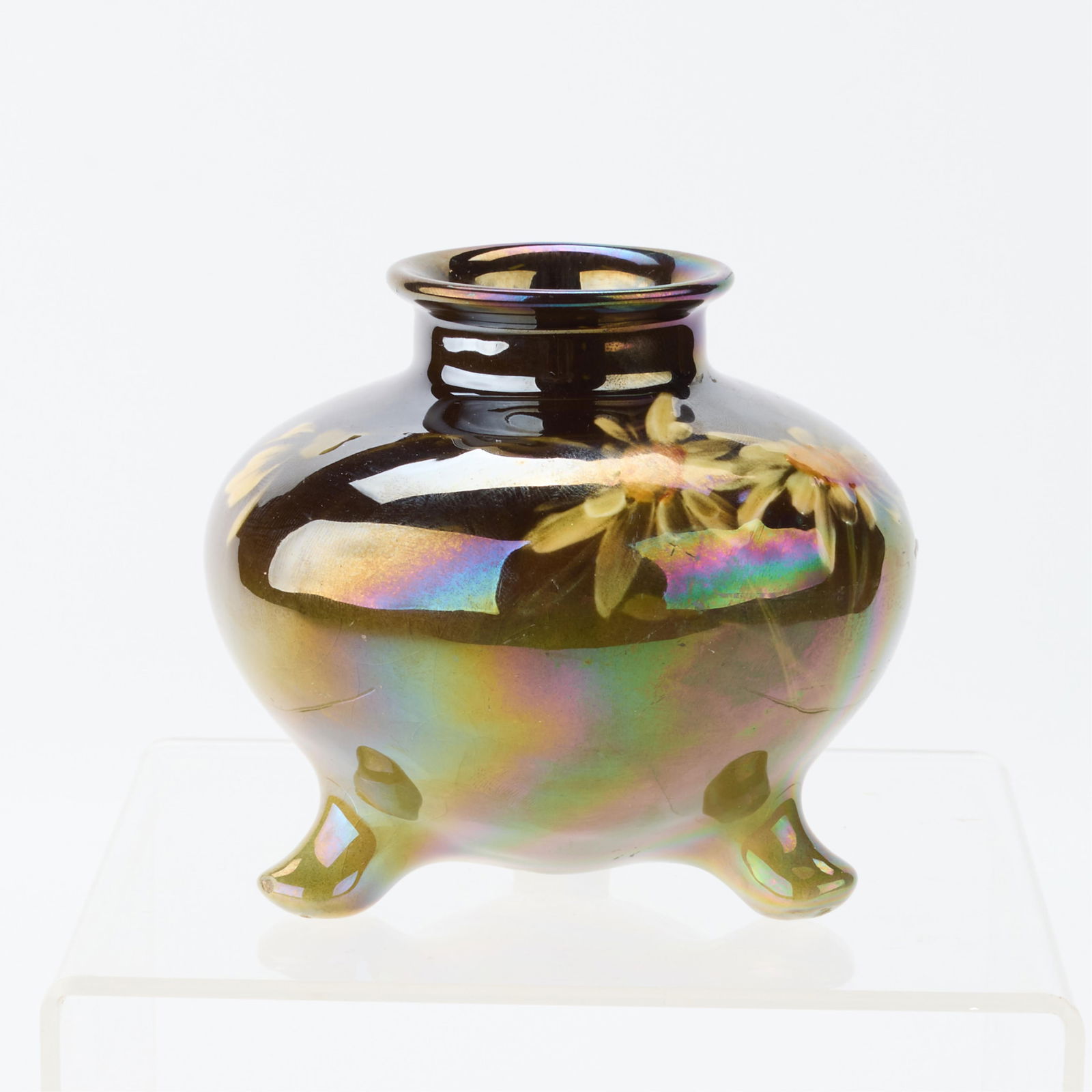 Denver China & Pottery Co. "Lonhuda" Tripod Vase: Denver China and Pottery Company, Colorado. Small and bulbous Arts & Crafts pottery "Lonhuda" vase resting on tripod feet, ca. 1901. Depicting daisies along the shoulder. With unusual iridescent glaze