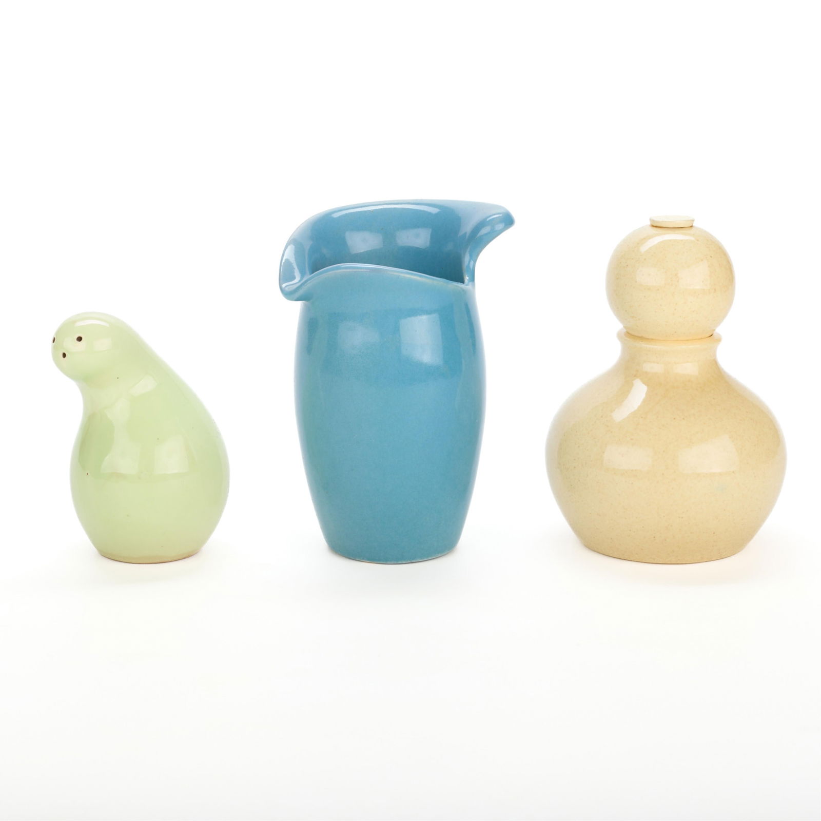 3 Zeisel for Red Wing "Town & Country" Vessels: Eva Zeisel (Hungarian-American, 1906-2011) for Red Wing Pottery, Minnesota. Group of three "Town & Country" glazed earthenware condiment vessels, mid-20th century. Including: One sand-yellow glazed