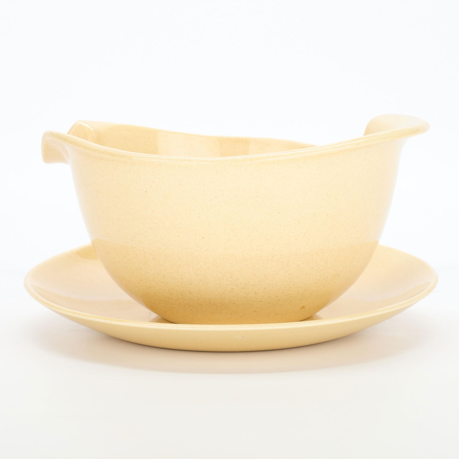 Zeisel for Red Wing "Town & Country" Bowl & Plate: Eva Zeisel (Hungarian-American, 1906-2011) for Red Wing Pottery, Minnesota. Group of two "Town & Country" glazed earthenware vessels, mid-20th century. Including one mixing bowl and one platter with p