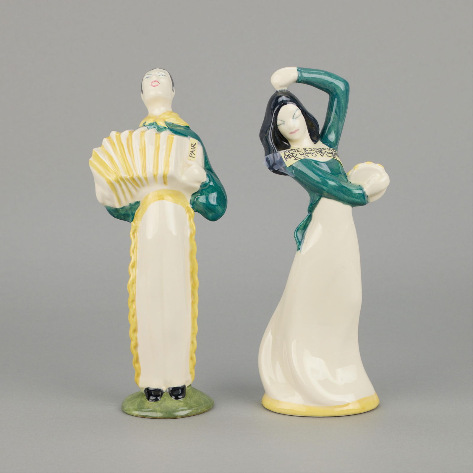2 Rare Red Wing Pottery "Musician" Figures: Red Wing Pottery, United States. Group of two rare stoneware figures, 20th century. Including one figure depicting an accordion player and a second figure in the form of a dancer with tambourine.
