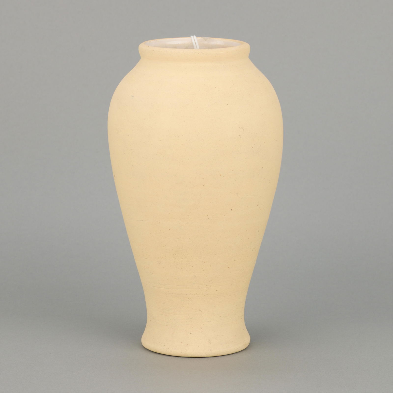 Antique Poss. Early Red Wing Art Pottery Vase: Antique hand-thrown stoneware vase, possibly an early example of Red Wing Art Pottery. Of baluster form with recessed neck and delicately flared footrim. Height: 9 1/2 in x diameter: 5 1/4 in.