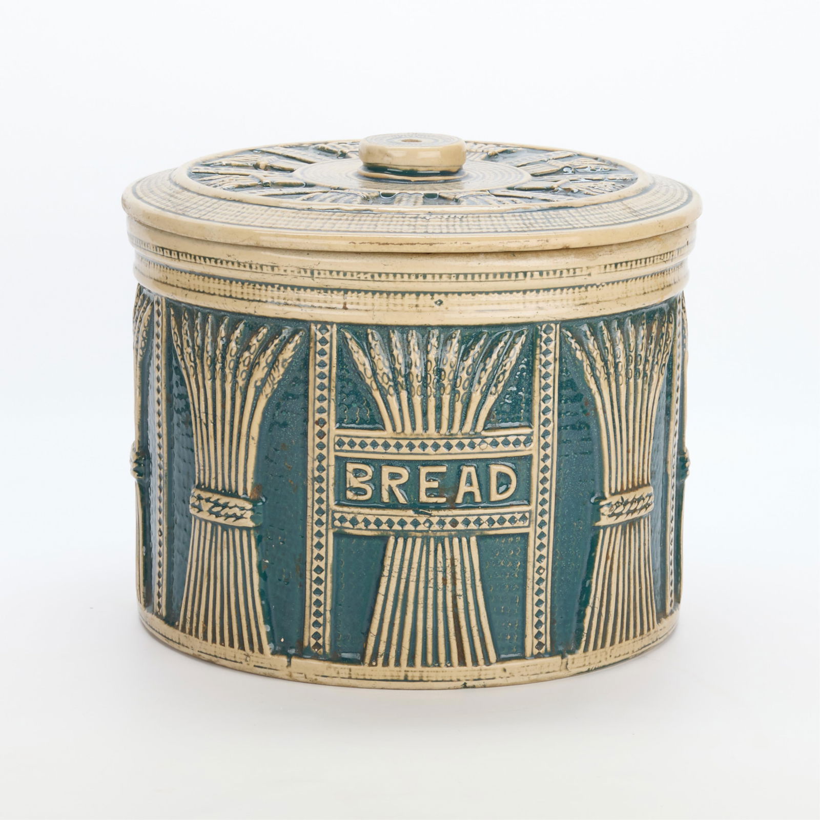 Large Red Wing Pottery Brushware Bread Crock: Red Wing Union Stoneware Co., Minnesota, United States. Large "brush ware" stoneware ceramic lidded bread box or dough crock, early 20th century. Depicting wheat stalks in relief throughout the exteri