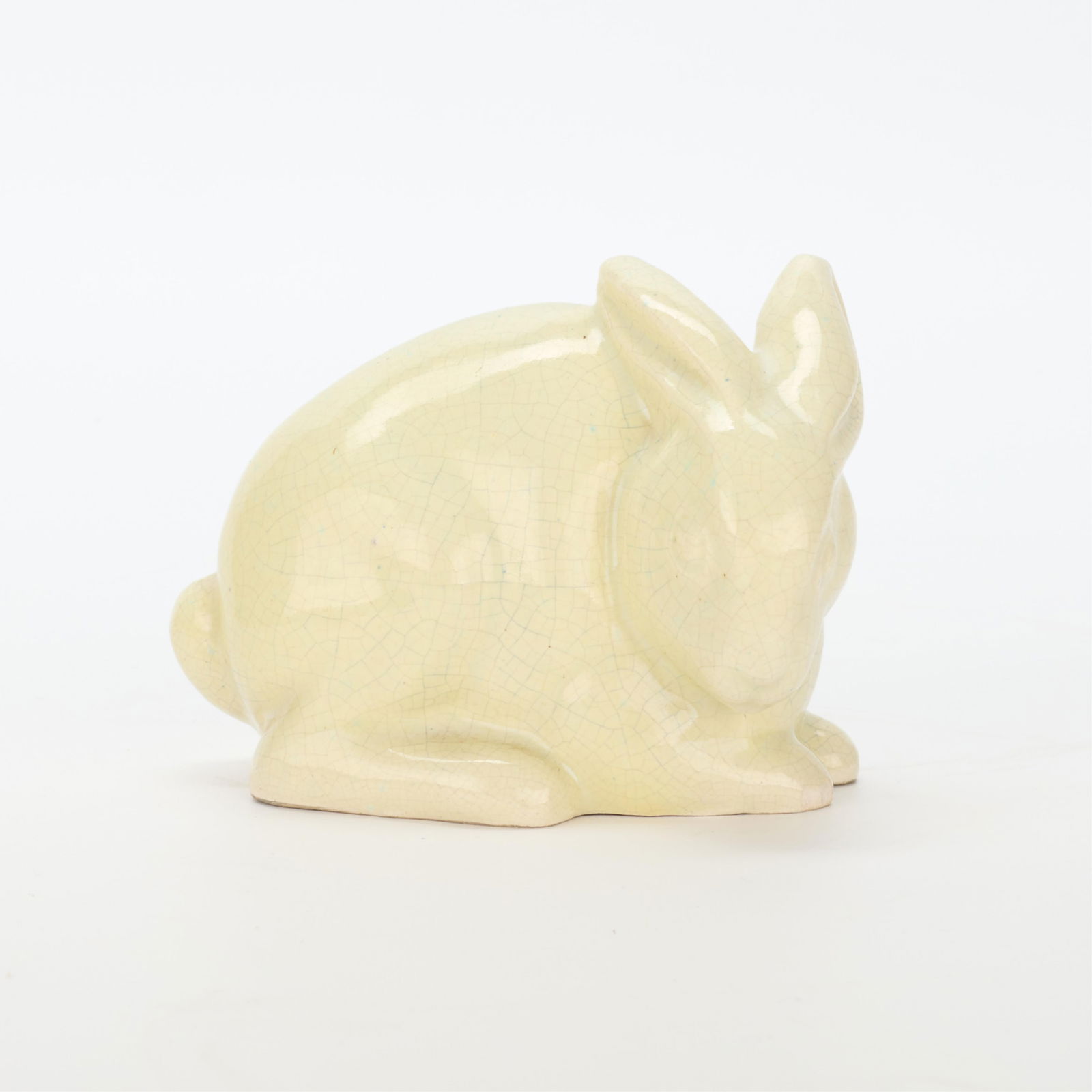 MN WPA Art Project Pottery Rabbit Figure: Minnesota WPA (Works Project Administration) Art Project pottery figure depicting a rabbit, early 20th century. With cream slip crackle glaze. Impressed along the footrim "MINN. W.P.A. Art Project" an