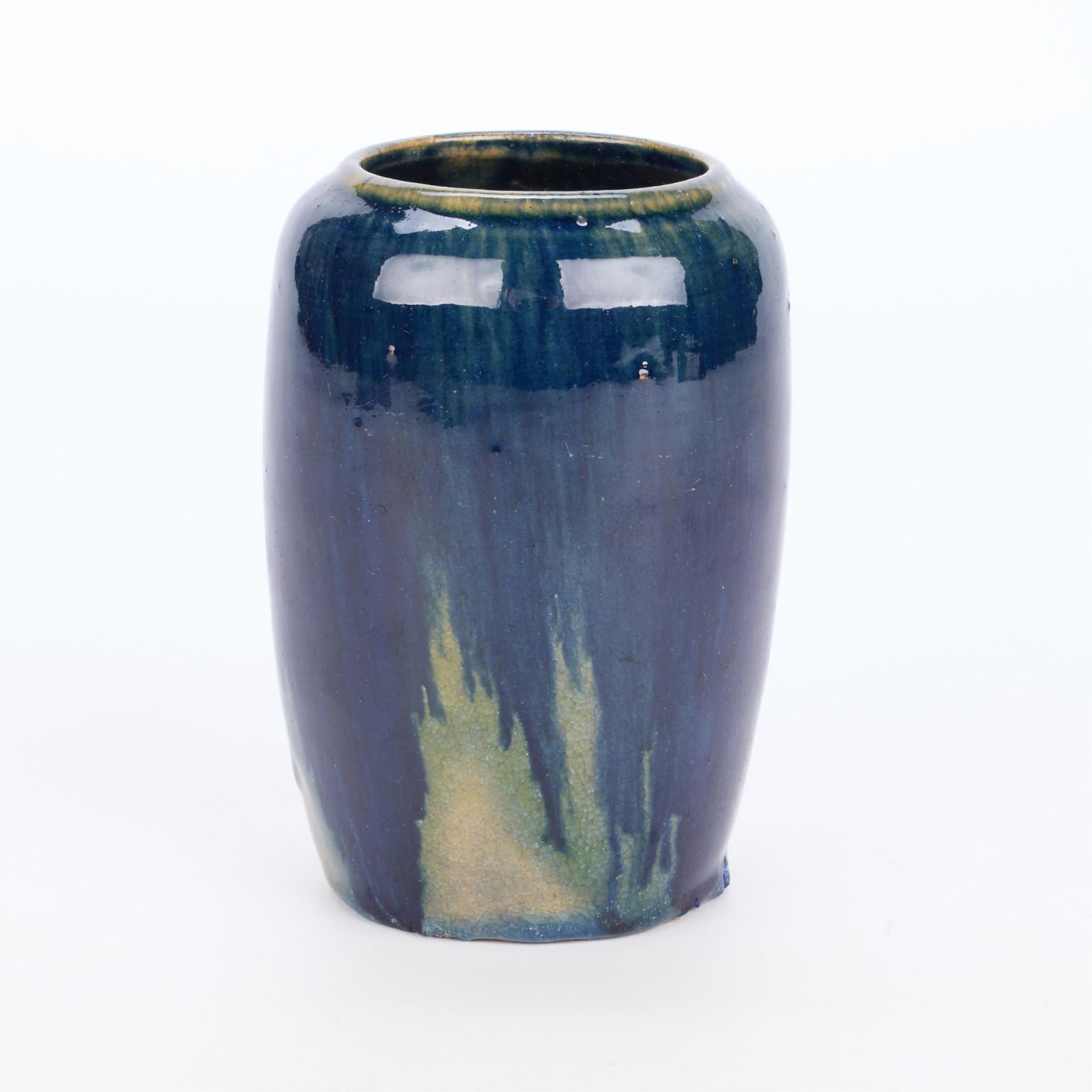 Arts & Crafts Ceramic Drip Glaze Bud Vase: Arts & Crafts pottery bud vase of rounded form. Executed in a glossy blue drip glaze.Height: 4 1/4 in x diameter: 2 3/4 in.