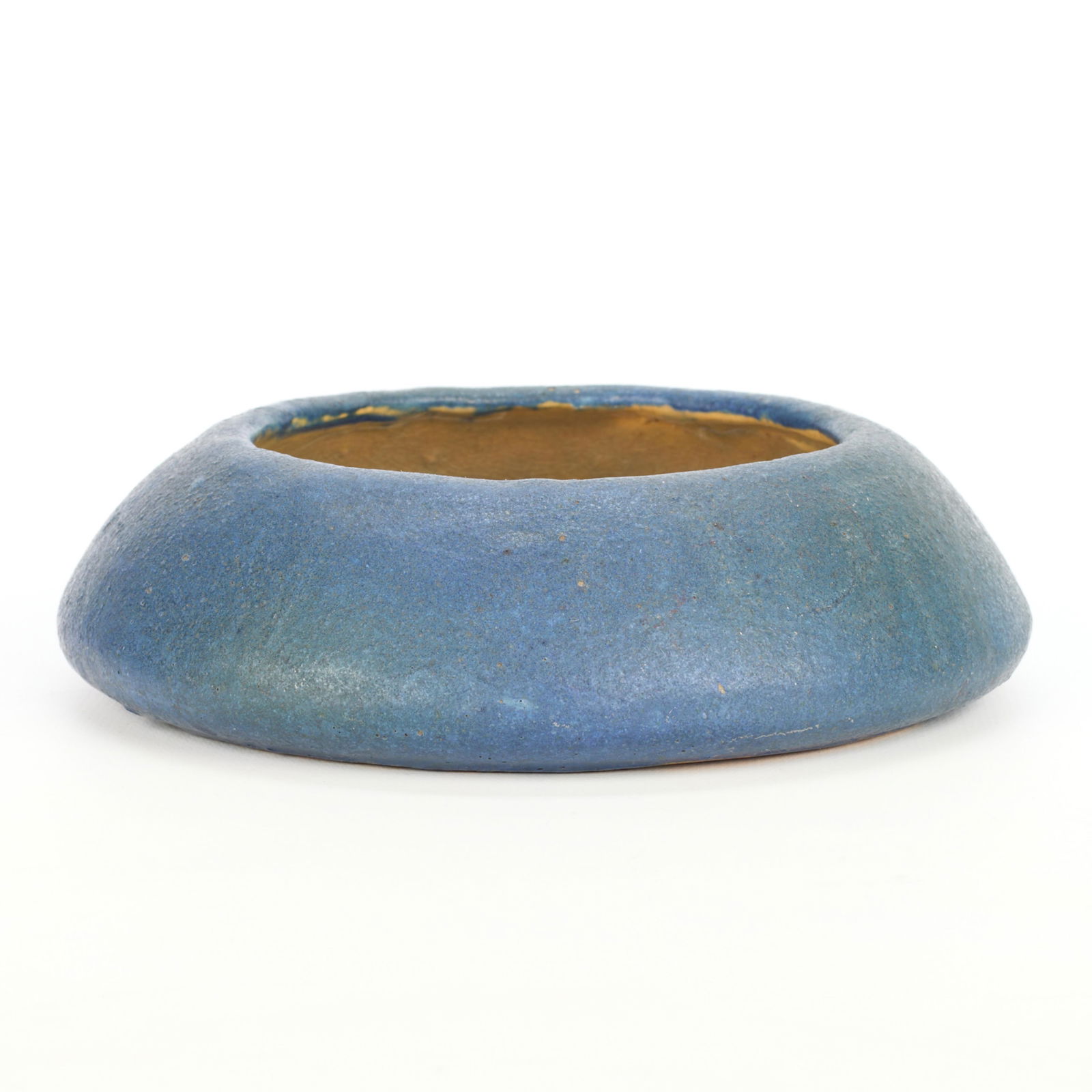 Arts & Crafts Handicraft Guild Fired Pottery Bowl: Arts & Crafts ceramic bowl of rounded, pyramidic form. Executed in a blue glaze. Incised initials "RM" along the underside; further incised "CHS," likely indicating that the bowl was made by a student