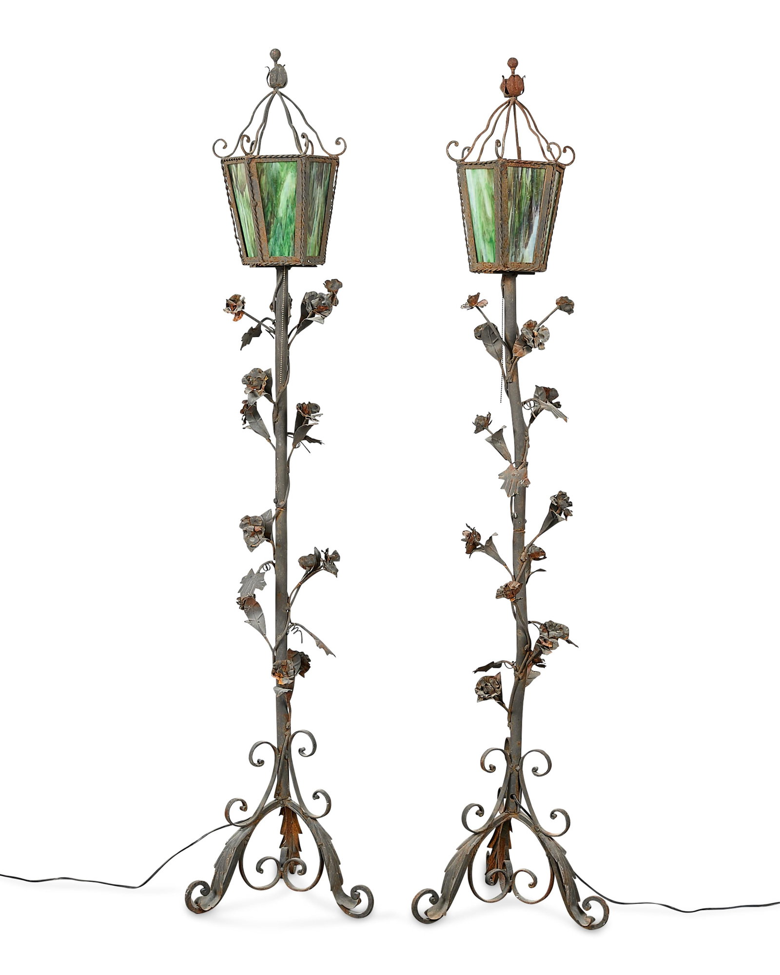 Pr Art Nouveau Slag Glass Floor Lamp Torchiers: Pair of vintage Art Nouveau-style decorative torchiers or floor lamps, ca. 1930s. Each with emerald green slag glass paneling and molded wrought iron frames in the form of climbing vines with blooming
