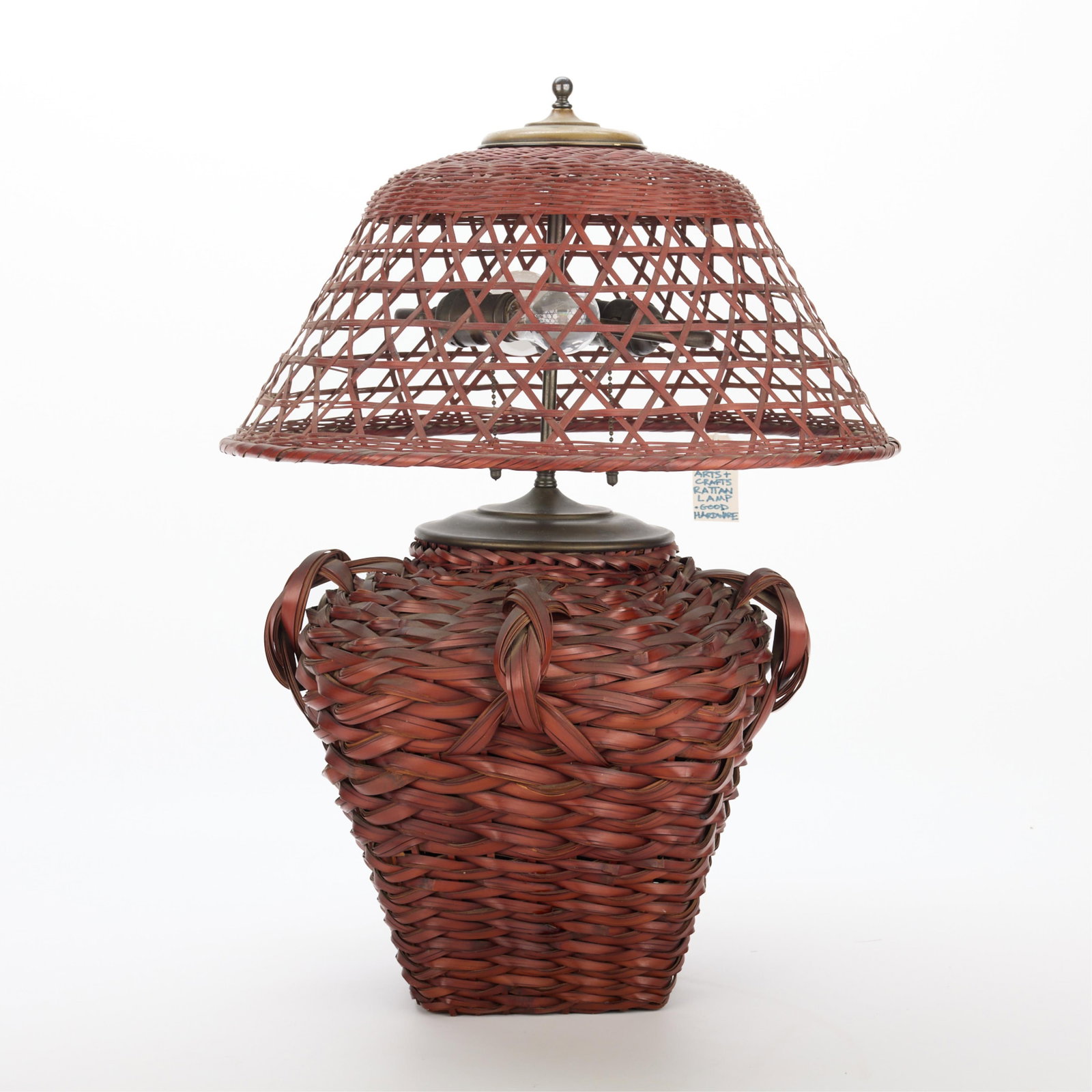 Stickley Style Arts & Crafts Rattan Table Lamp: Style of Stickley Arts & Crafts rattan or wicker woven basket table lamp, early 20th century.Height: 23 in x diameter: 17 1/2 in.