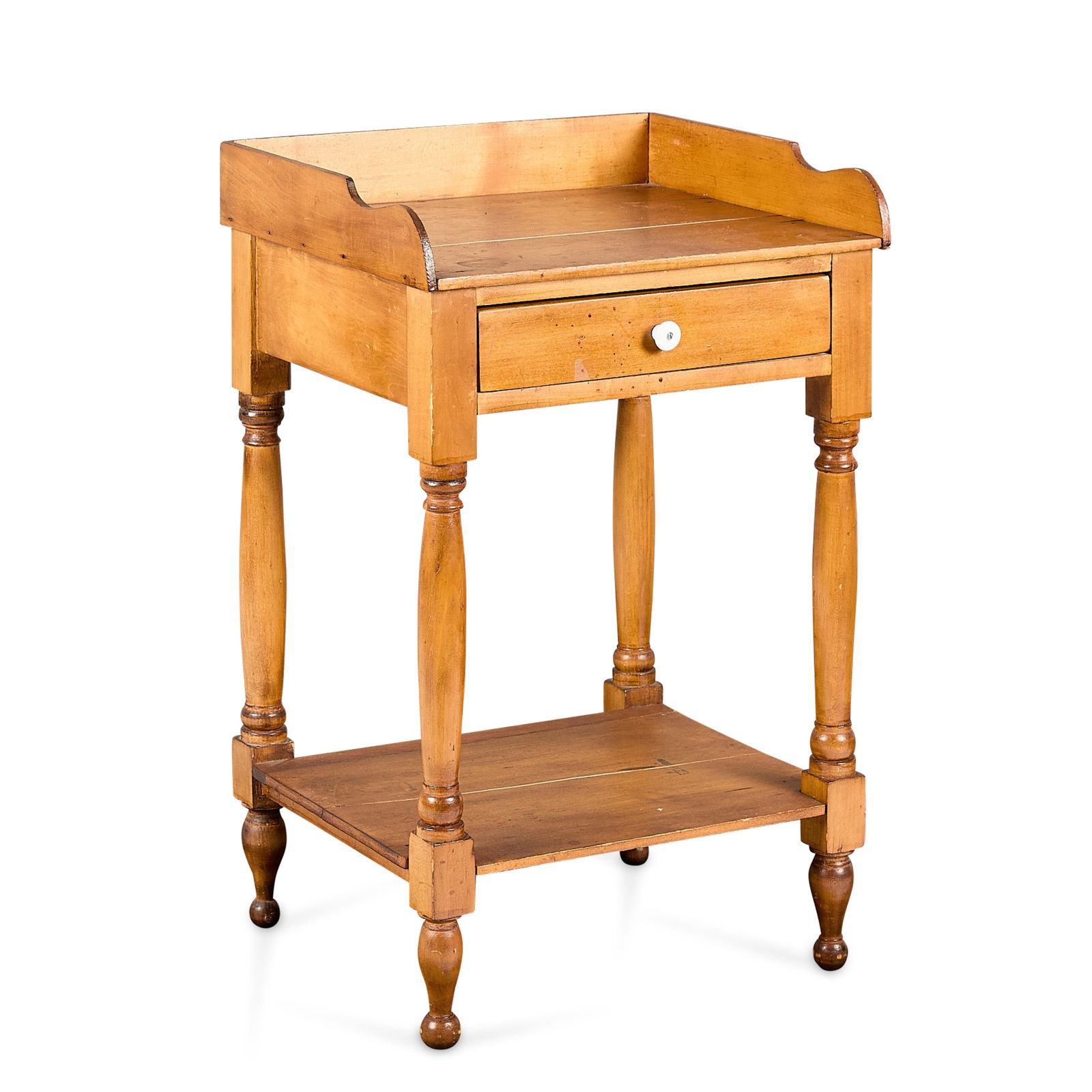 Antique American Pine Sheraton Style Washstand: Antique American Sheraton style yellow pine washstand, 19th century. Featuring a galleried working or writing surface, square nail construction, and dovetailed drawer. Resting on four turned legs.Prov