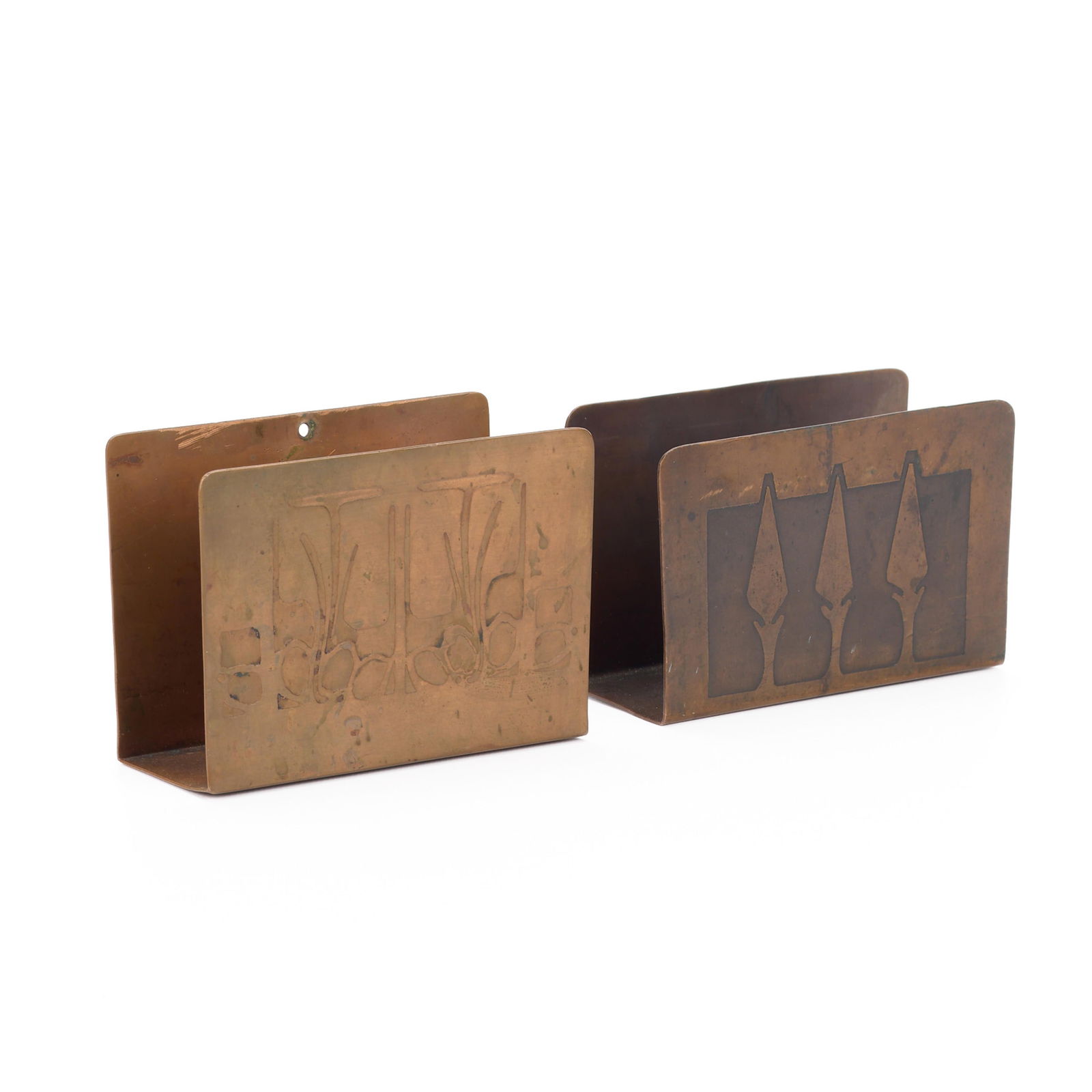 2 Pairs Minneapolis Handicraft Copper Letter Racks: Handicraft Guild of Minneapolis, Minnesota. Two pairs of Arts & Crafts handwrought copper letter racks, ca. 1900s-1910s. Each depicting geometric motifs. Each marked along the underside.(Smaller) Heig