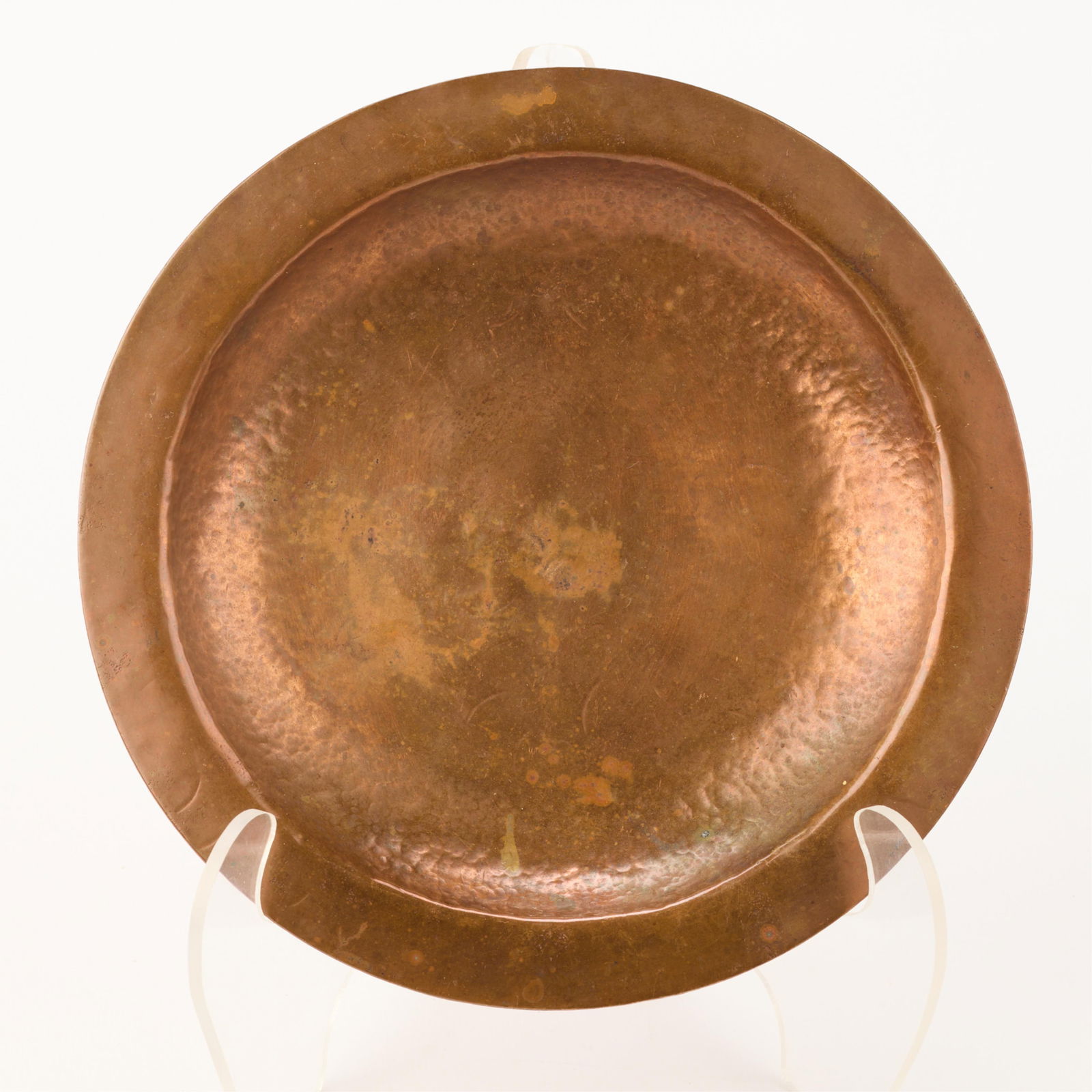 Dirk Van Erp Arts & Crafts Hammered Copper Plate: Dirk van Erp (Dutch/American, 1862-1933). Arts & Crafts hand-wrought hammered copper plate or dish. Impressed windmill mark along the underside.Diameter: 8 in. Weight: 314.3 g.