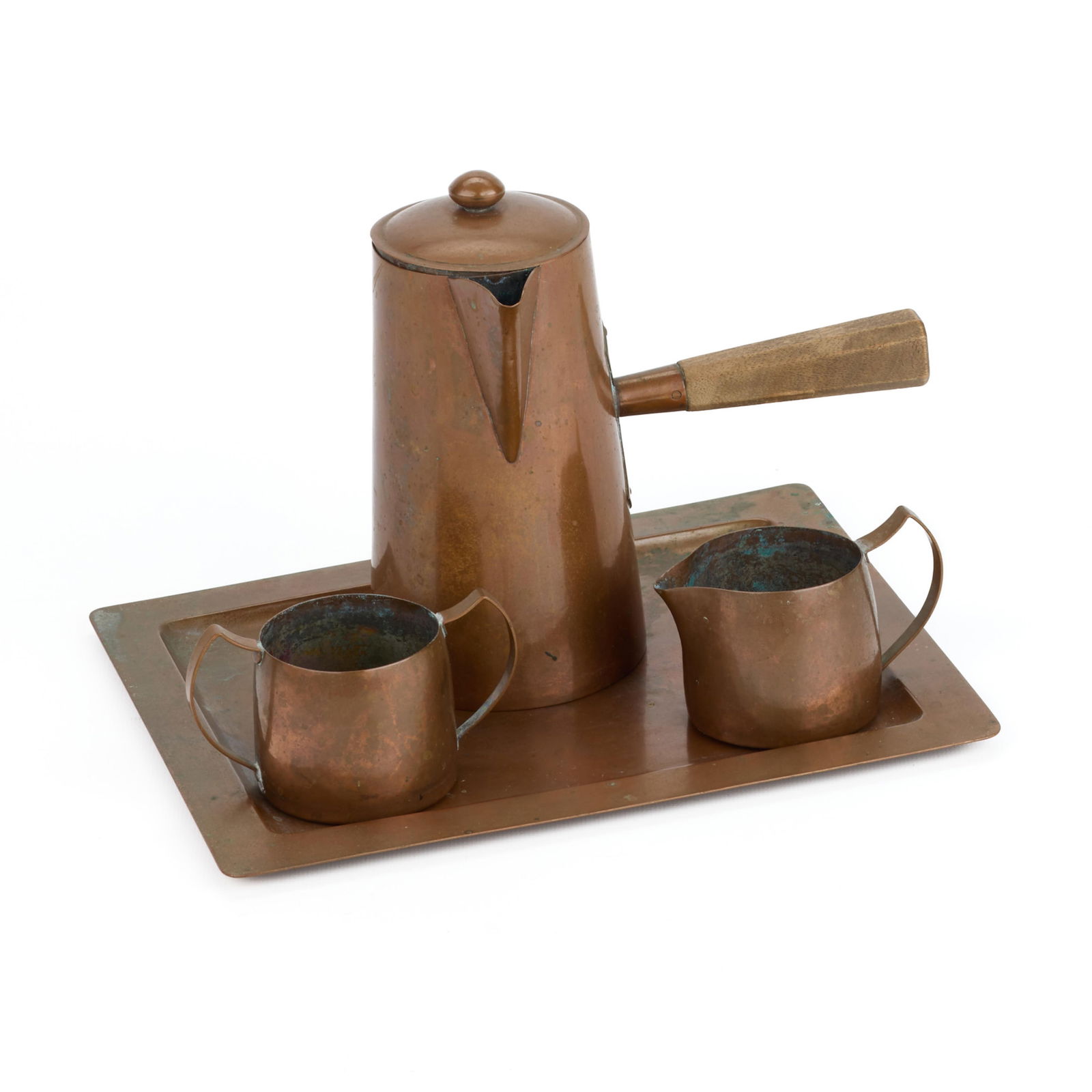 Set 4 Minneapolis Handicraft Copper Coffeeware: Handicraft Guild of Minneapolis, Minnesota. Arts & Crafts handwrought copper coffee set, ca. 1900s-1910s. Including coffee pot, creamer, sugar bowl, and tray. Each stamped along the underside.Literatu