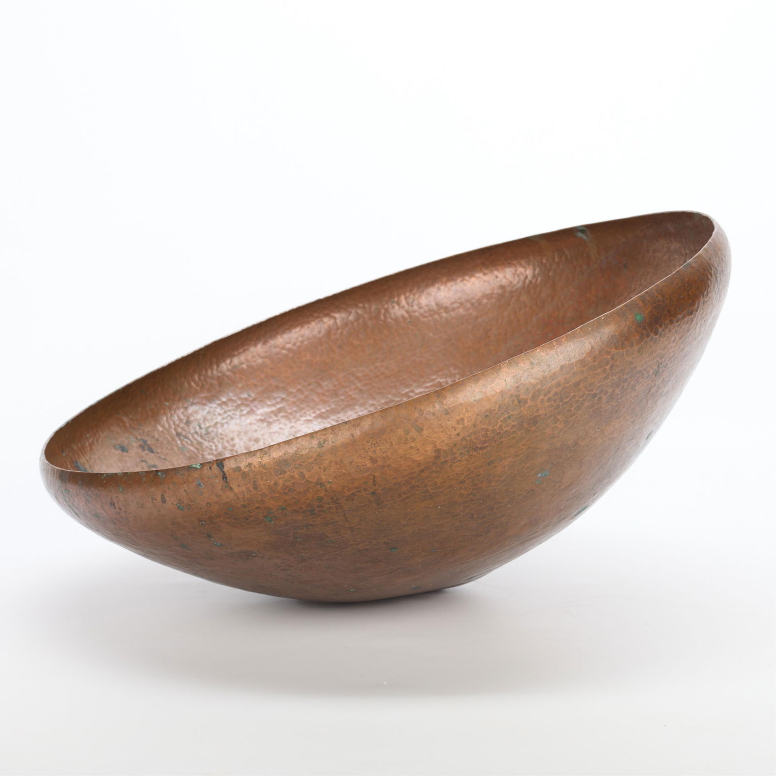 Northland College Arts & Crafts Shop Copper Bowl: Northland College Craft Shop, Wisconsin, United States. Large Arts & Crafts handwrought hammered copper bowl. Marked along the underside. Height: 6 1/2 in x diameter: 16 in. Weight: 3 lbs 11 oz.