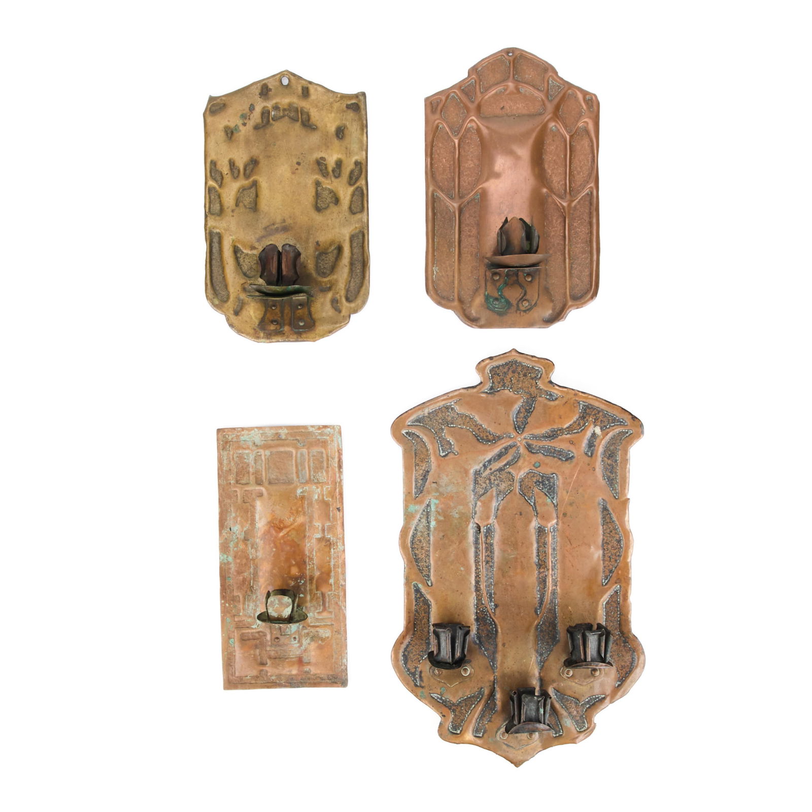 4 Style of Donaldson Handicraft Copper Sconces: Style of Douglas Donaldson (American, b. 20th century) for Handicraft Guild of Minneapolis, Minnesota. Group of four copper candlesticks or candle holder wall sconces, ca. 1900s-1910s. Of varying