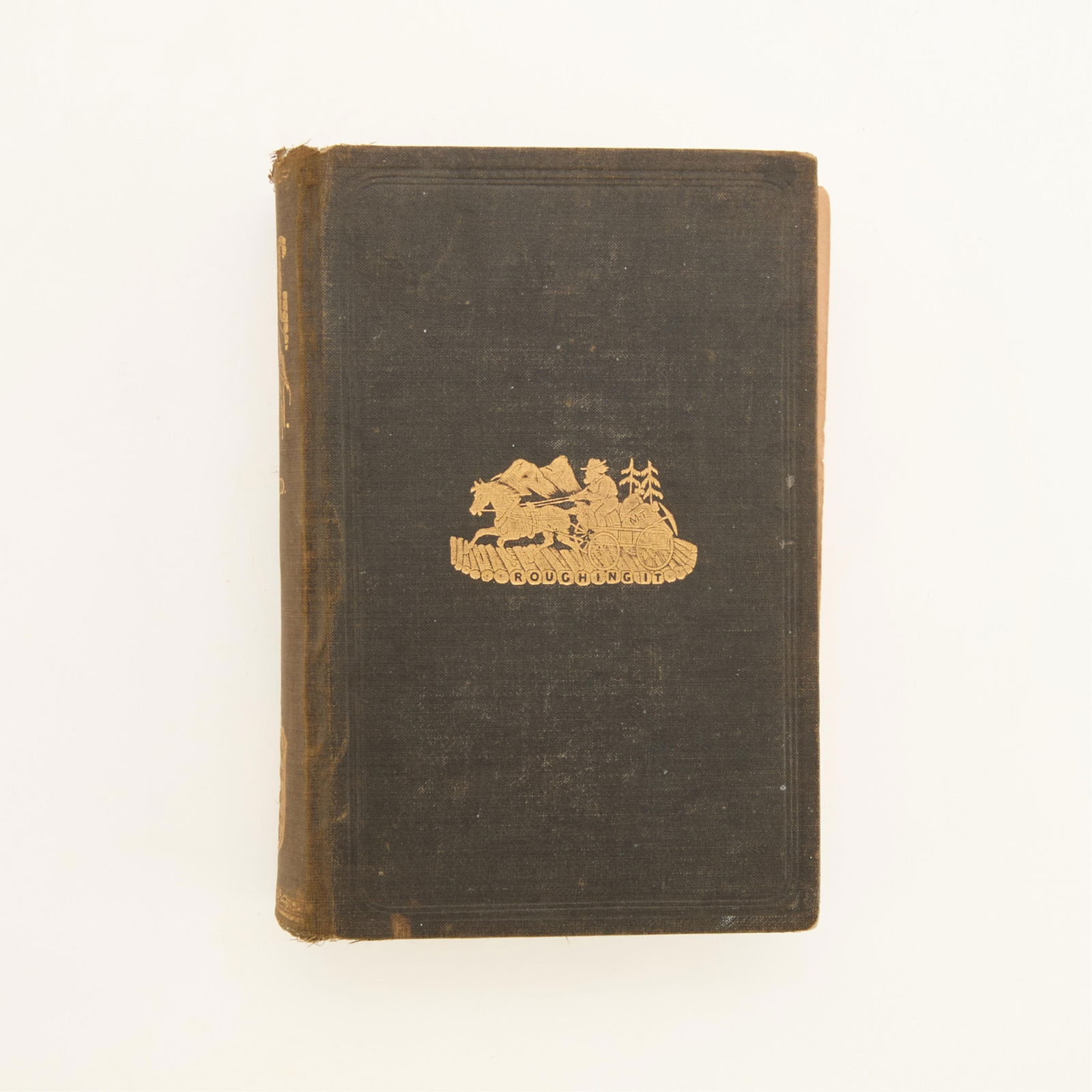 Mark Twain "Roughing It" Book 1892: Mark Twain, "Roughing It," Hartford: American Publishing Co., 1892. First published in 1872.Height: 9 in x width: 6 1/4 in x depth: 1 3/4 in.