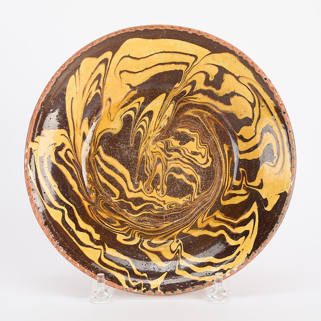 18th c. English Marbled Slipware Pie Dish: 18th century English earthenware ceramic dish, likely Staffordshire or Midlands, ca. 1720. Press-molded redware pottery with marbled brown and yellow slip. With coggled "pie crust" rim. For a